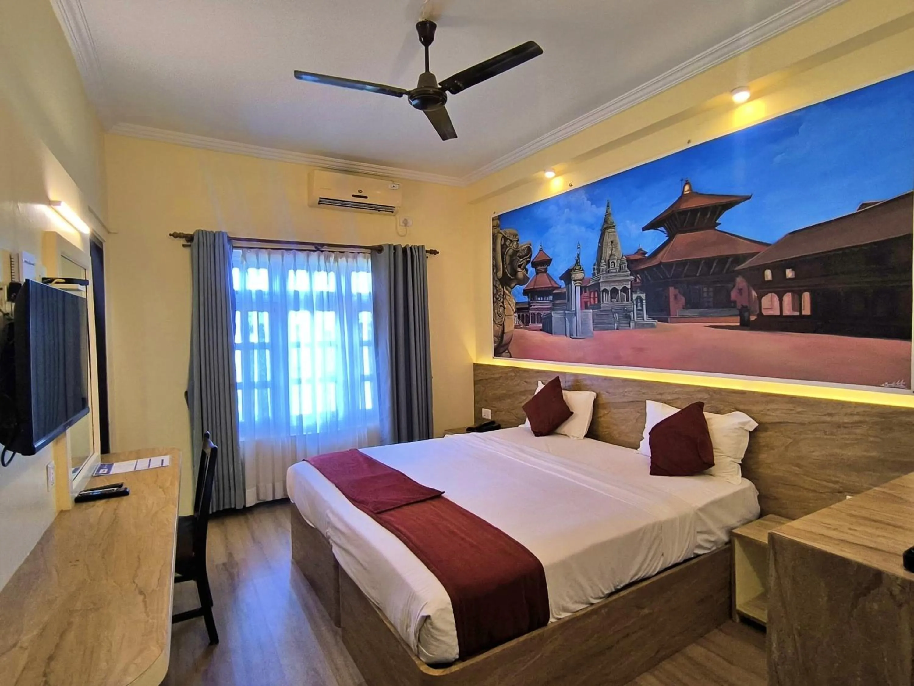 Bed in Hotel Peaceland Lumbini