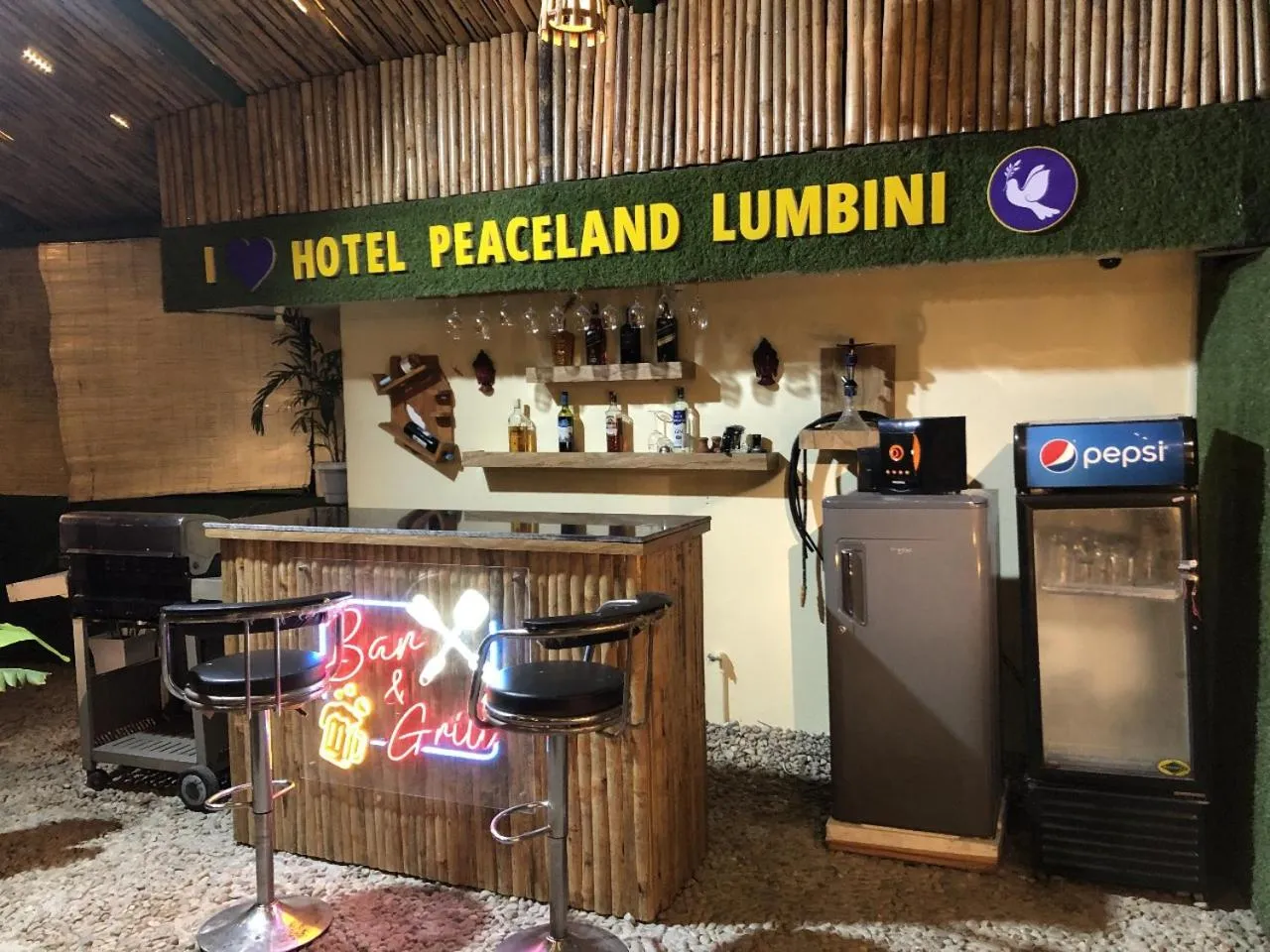 Property logo or sign in Hotel Peaceland Lumbini