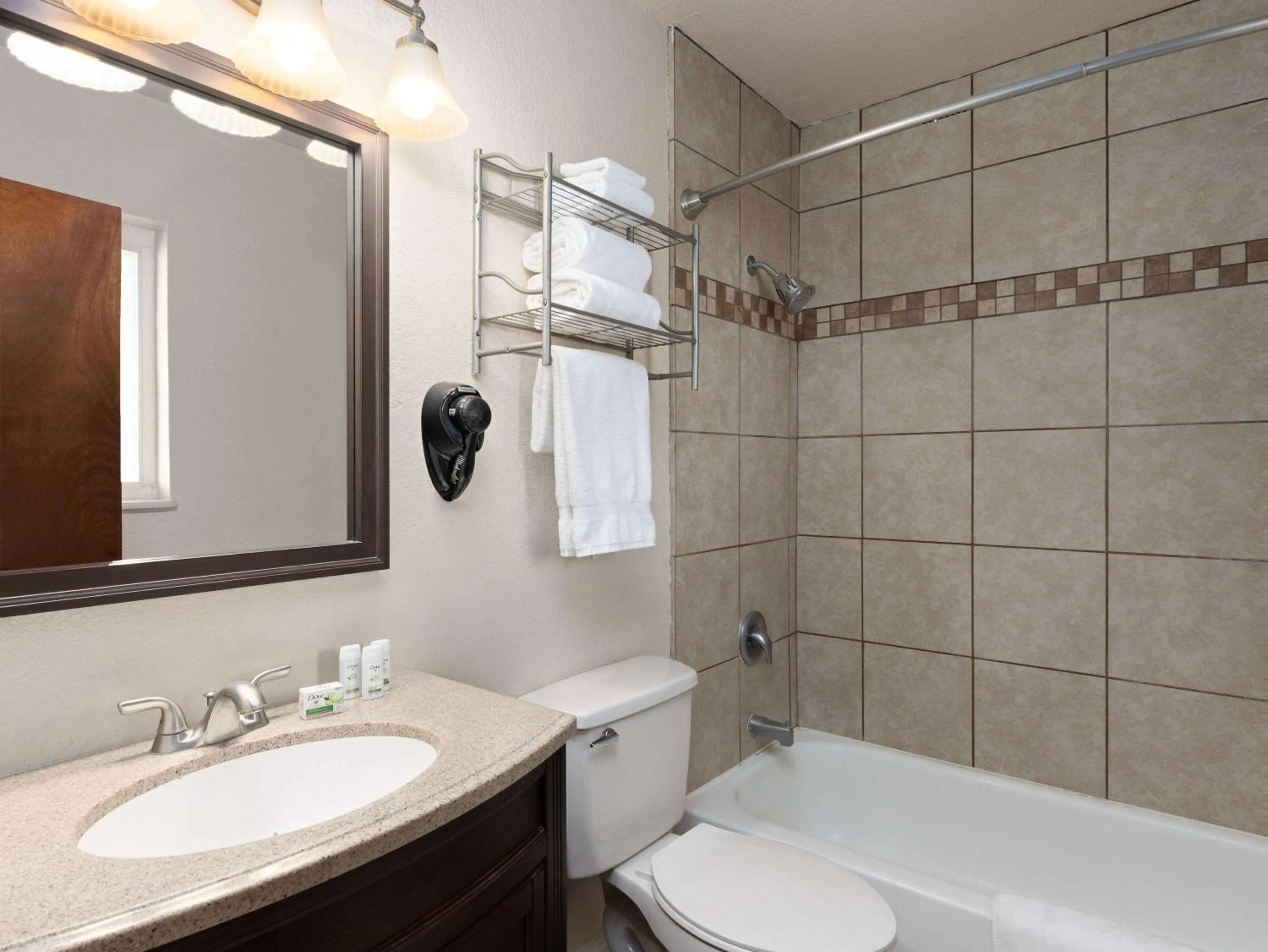 Bathroom in Ramada by Wyndham Elko Hotel at Stockmen's Casino