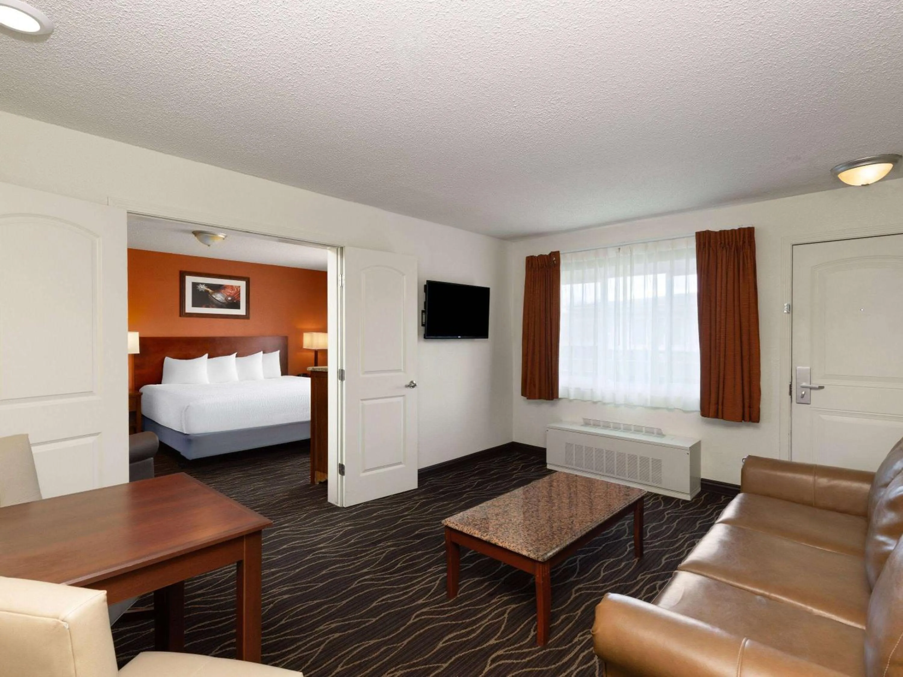 Photo of the whole room, Bed in Ramada by Wyndham Elko Hotel at Stockmen's Casino