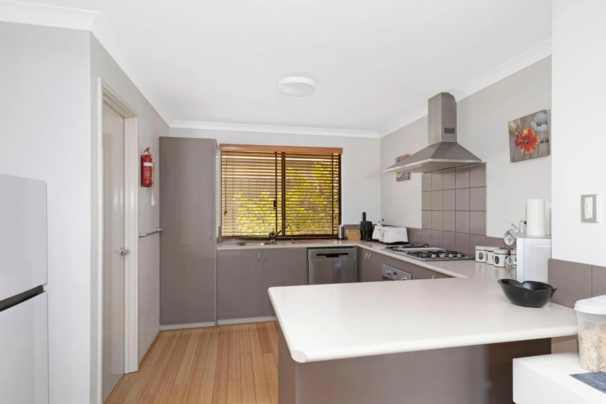 Communal kitchen in Baudins of Busselton Bed and Breakfast - Adults only
