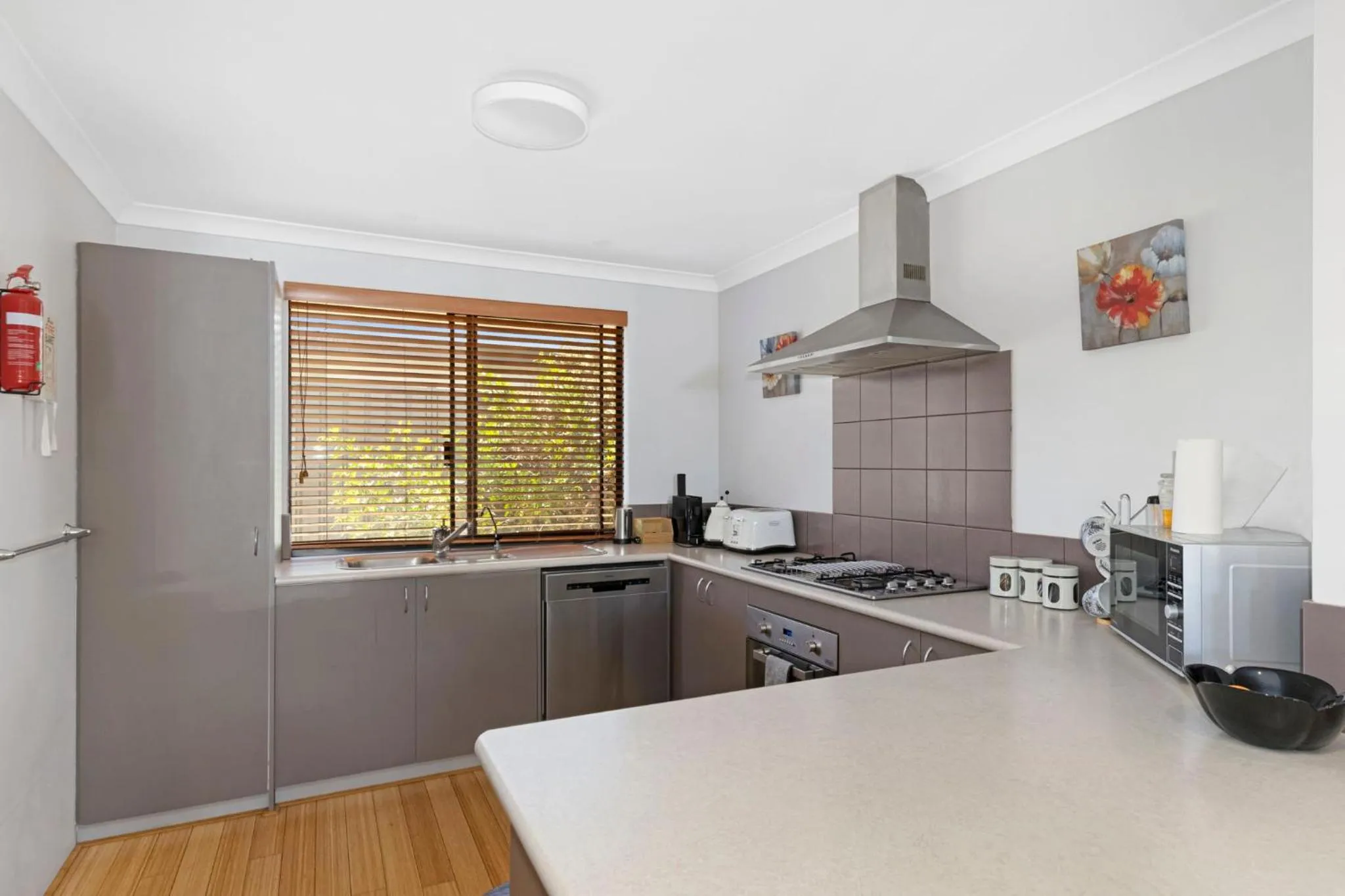 Communal kitchen in Baudins of Busselton Bed and Breakfast - Adults only