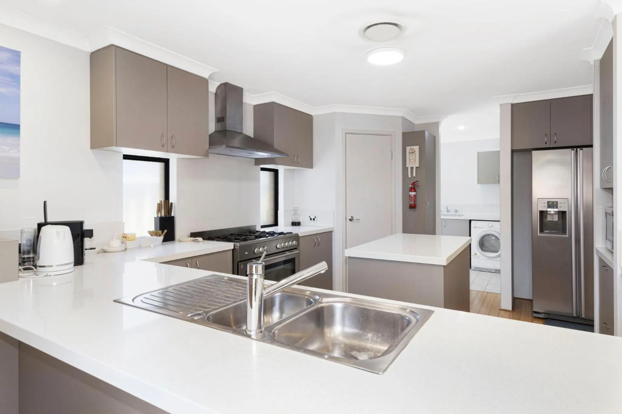 Communal kitchen in Baudins of Busselton Bed and Breakfast - Adults only