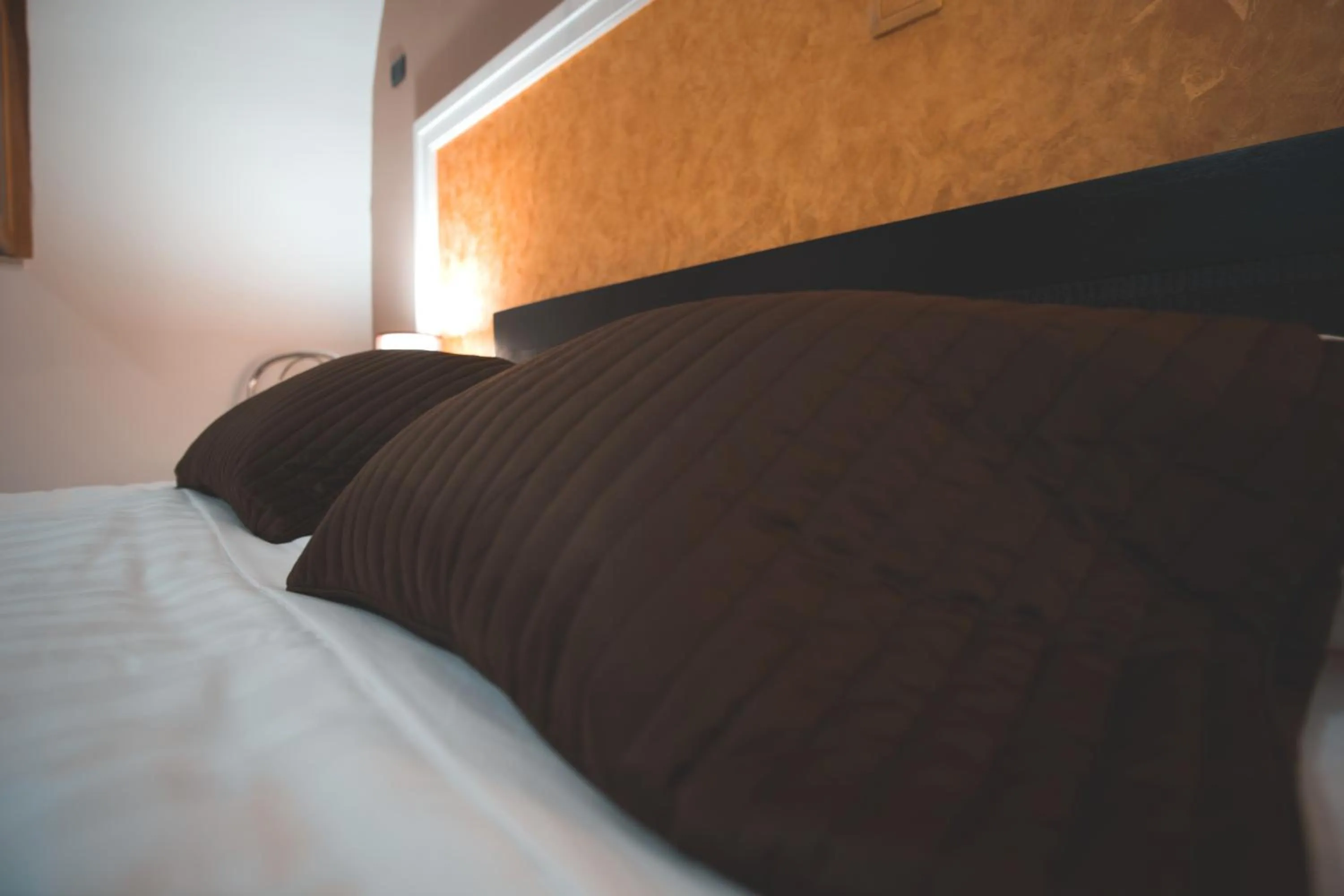 Decorative detail, Bed in Il Vicolo - Affittacamere