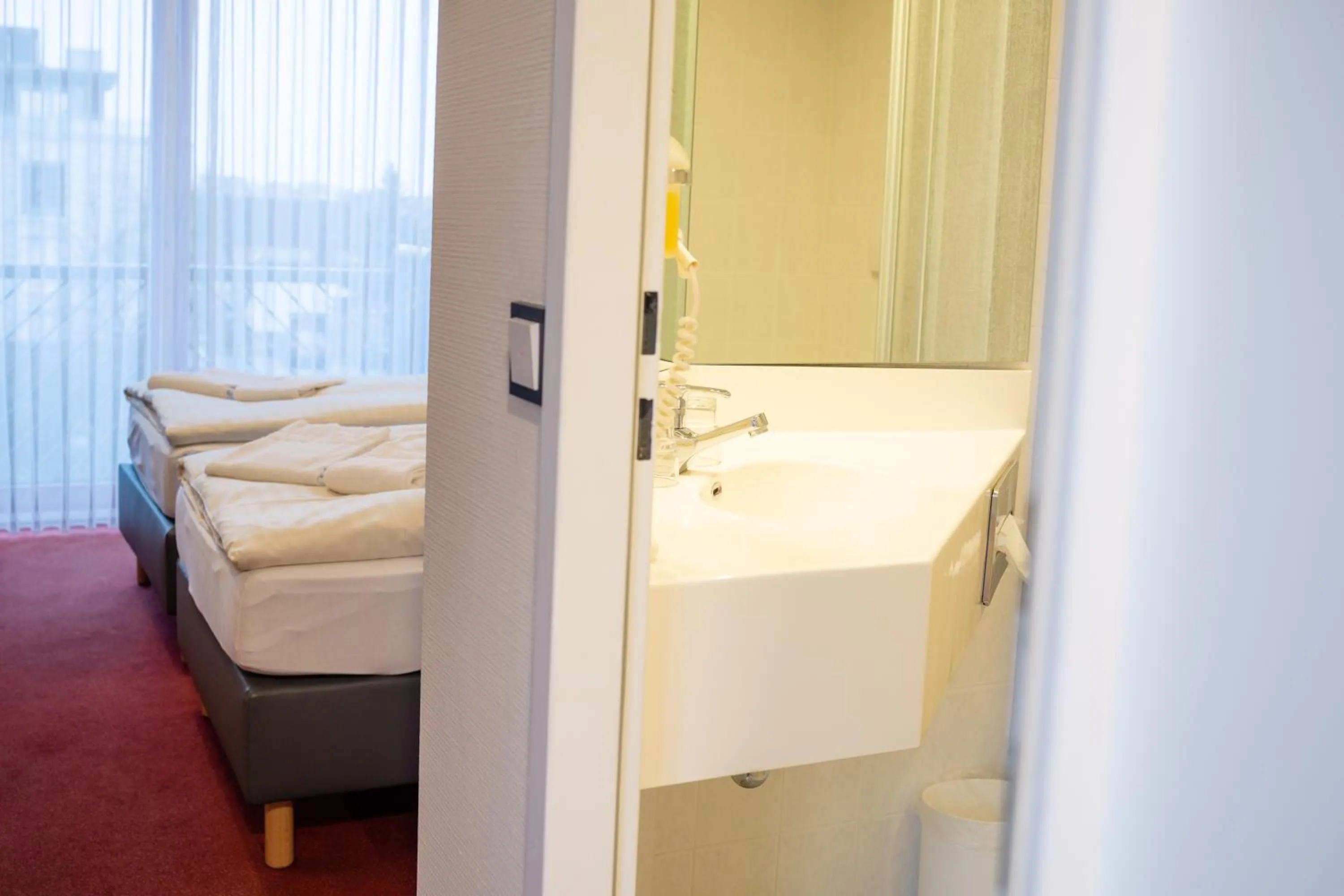 Photo of the whole room, Bed in Landhotel Stüer