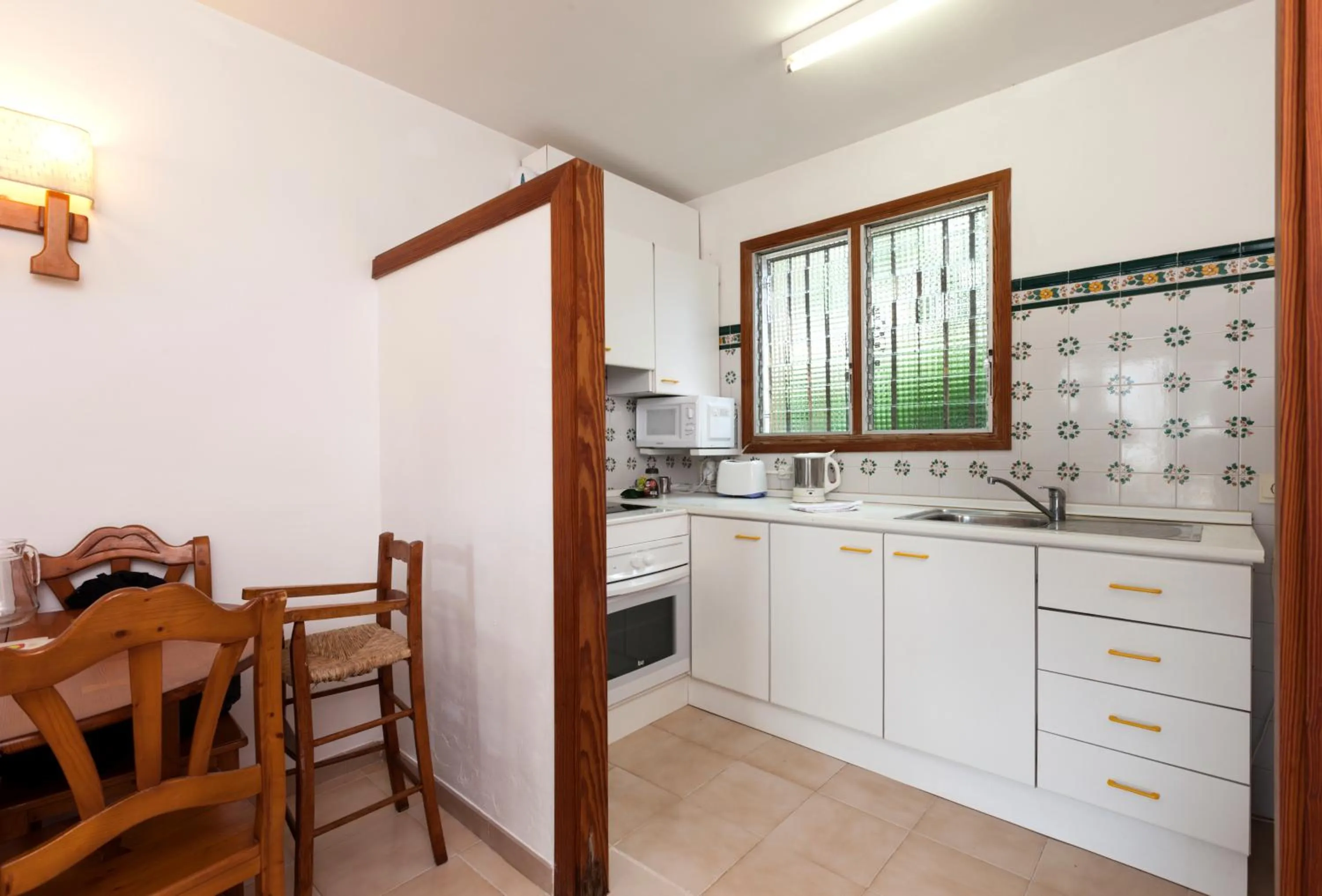 Kitchen or kitchenette in Apartamentos Leo