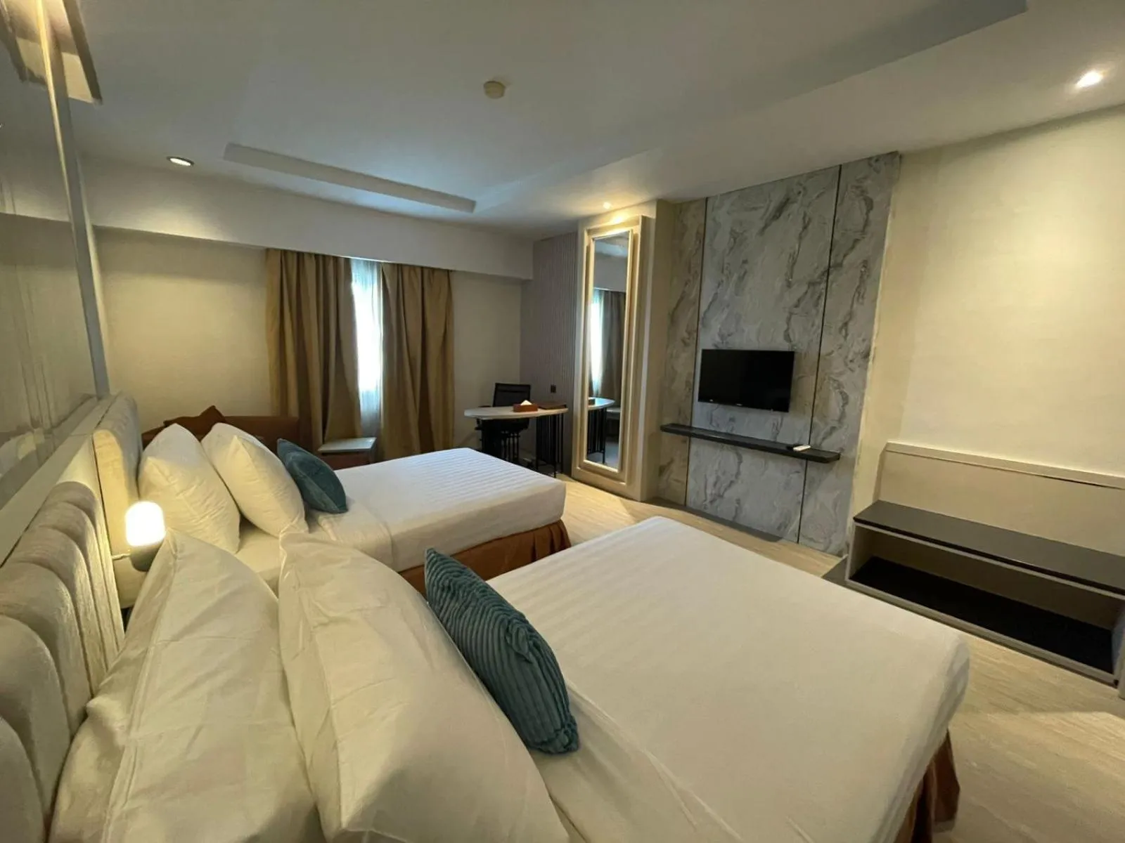 Bed in Abadi Suite Hotel & Tower