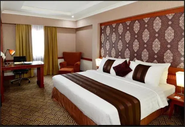 Bed in Abadi Suite Hotel & Tower Bed in Abadi Suite Hotel & Tower