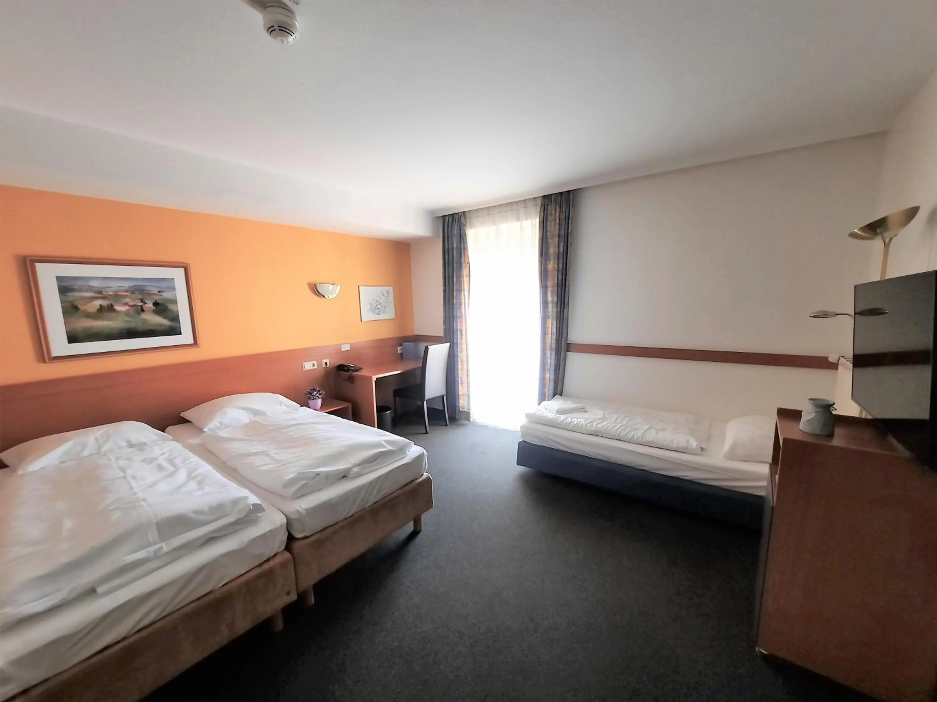 Photo of the whole room, Bed in Parkhotel Kevelaer