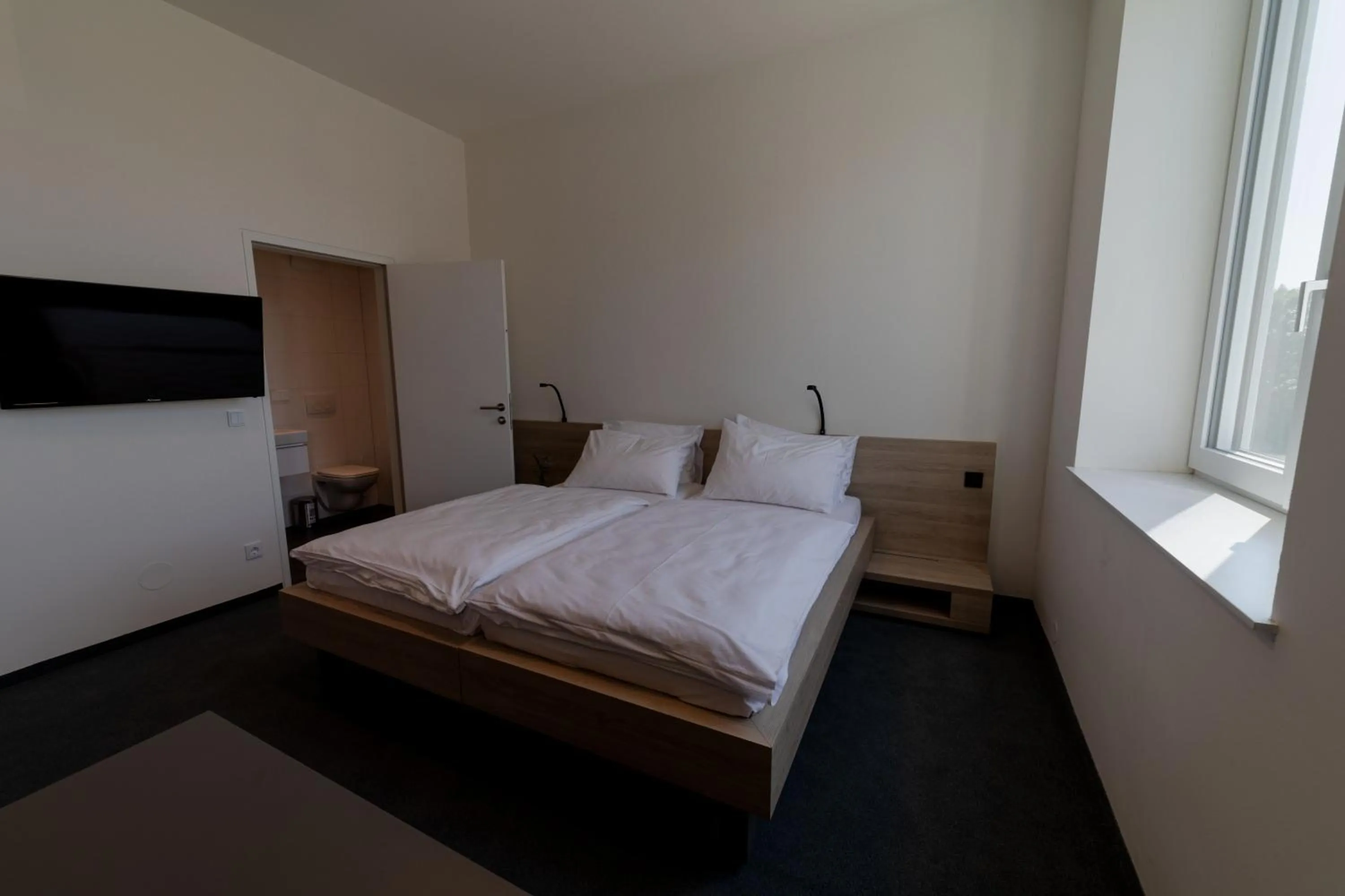 Bed in TT-ROOMS - kontaktlos mit Self Check-in I FREE PARKING