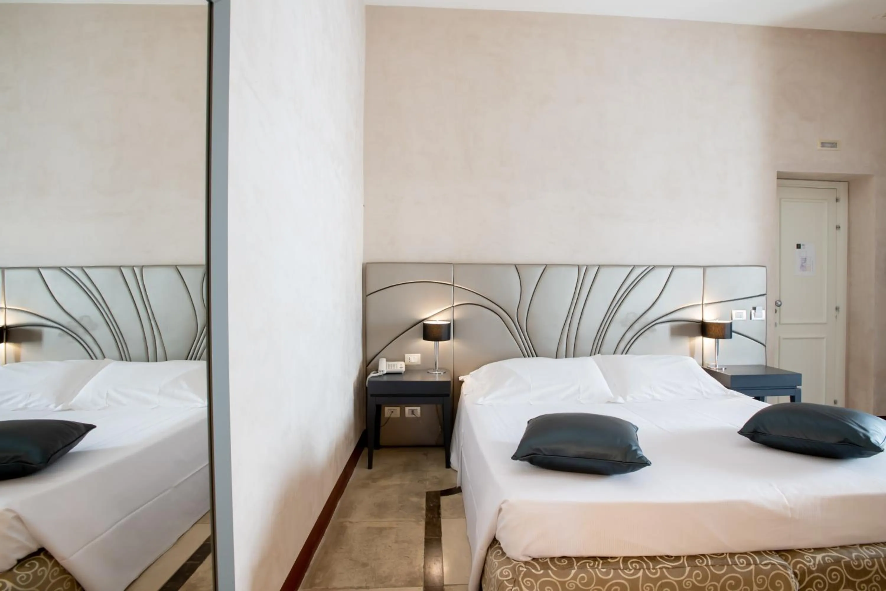 Bed in De Stefano Palace Luxury Hotel