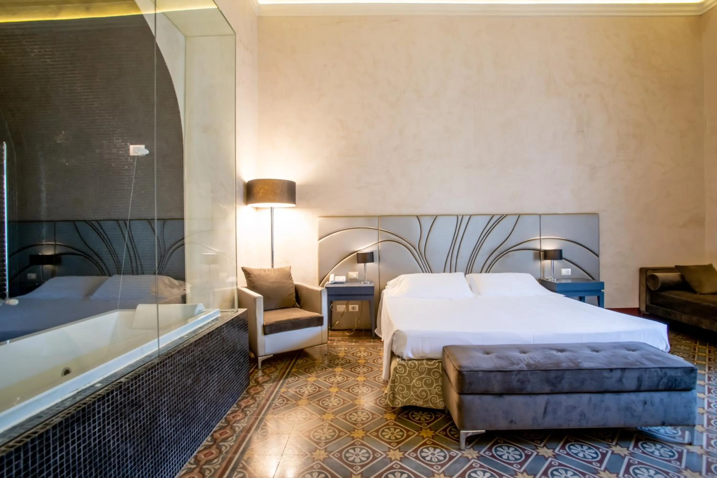 Bed in De Stefano Palace Luxury Hotel