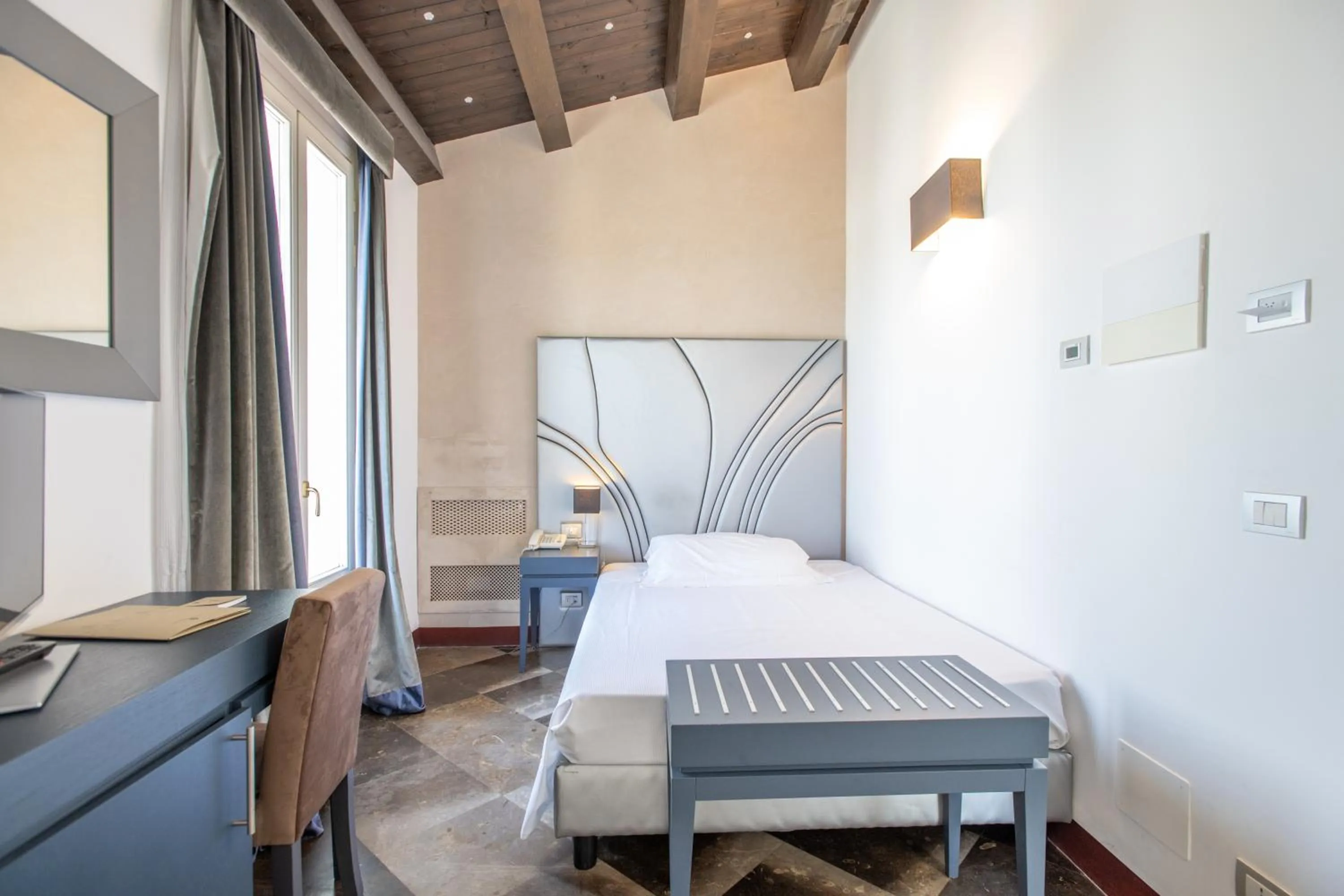 Bed in De Stefano Palace Luxury Hotel