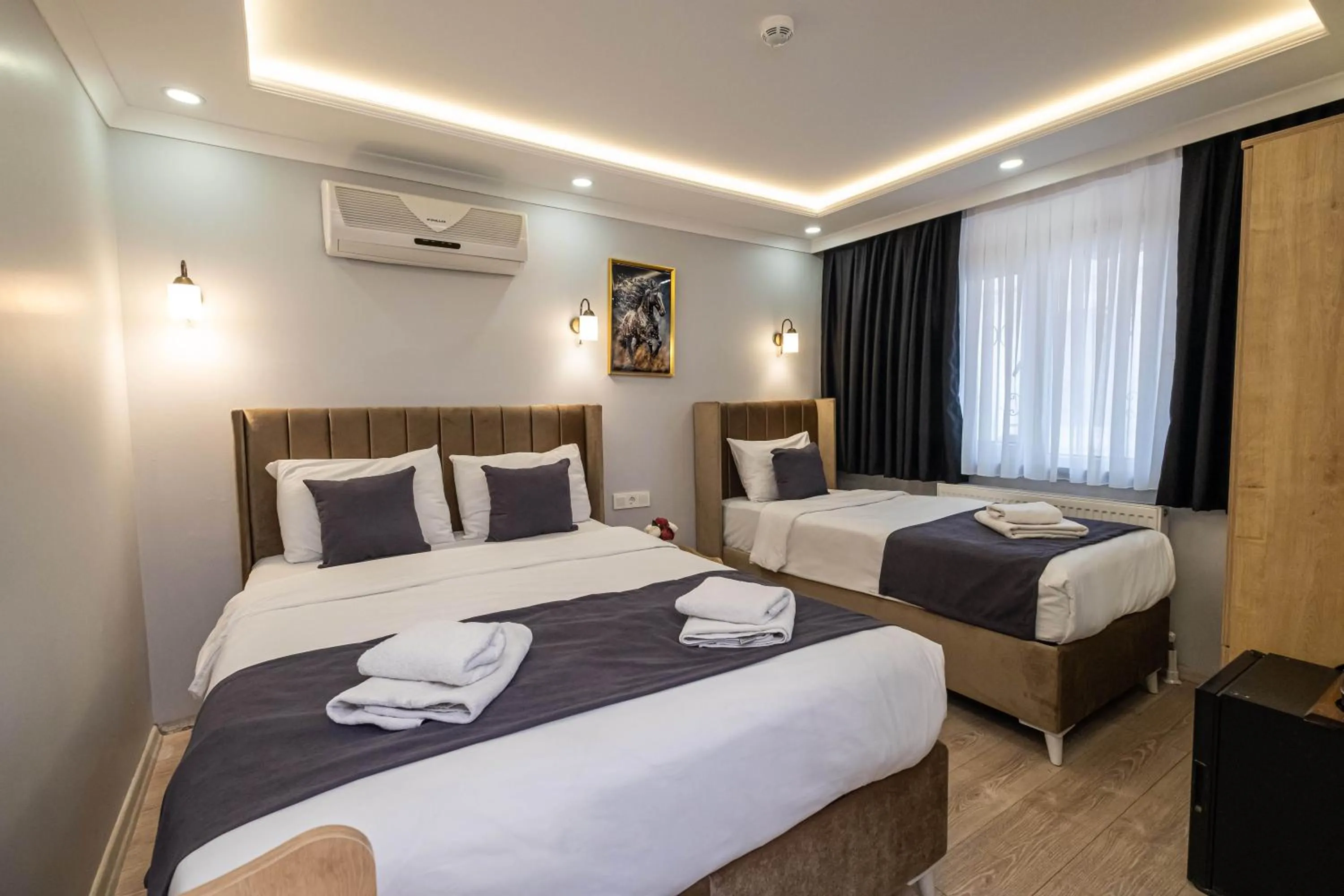 Bed in Family Istanbul Hotel