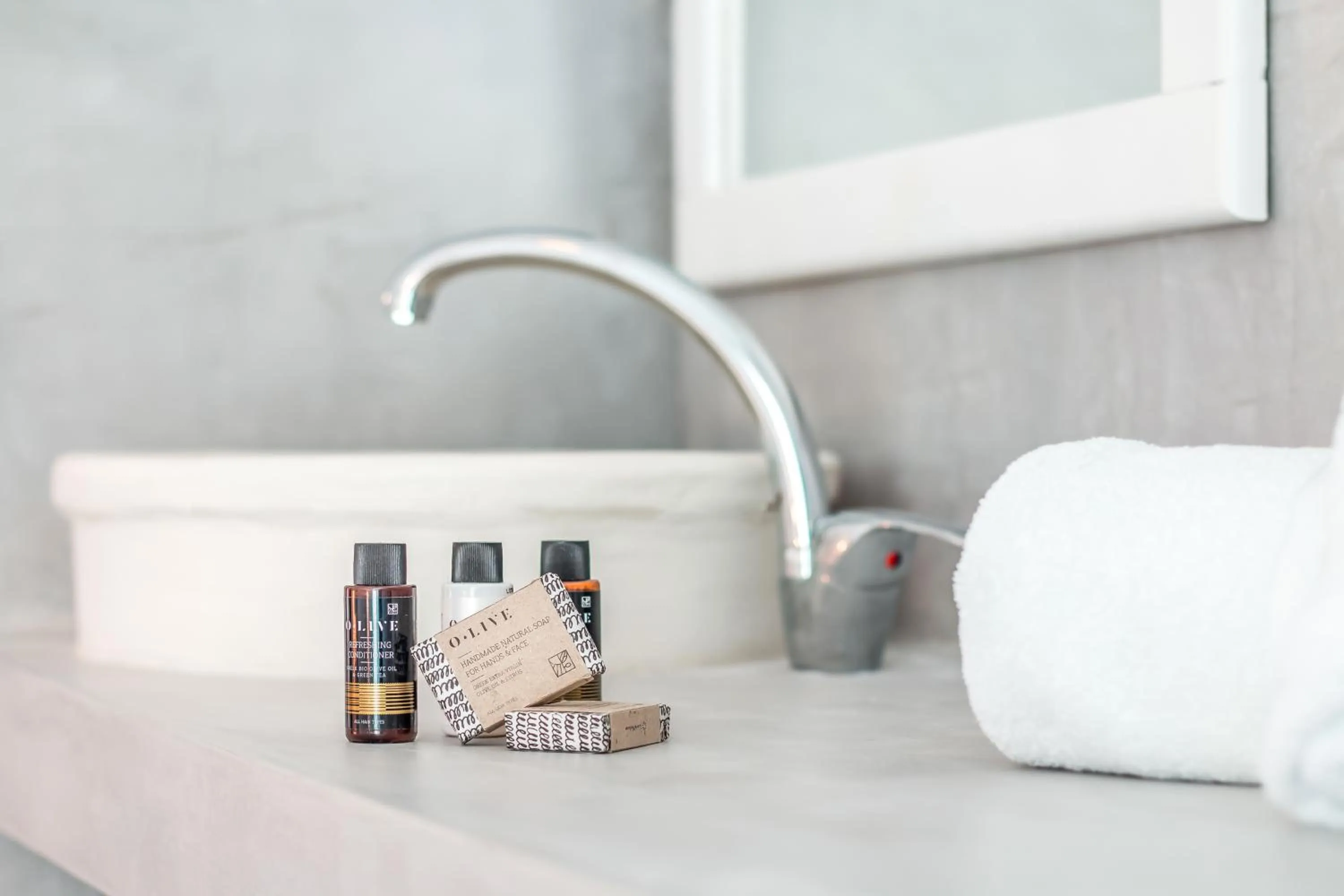 Bathroom in Tinas Plus Hotel