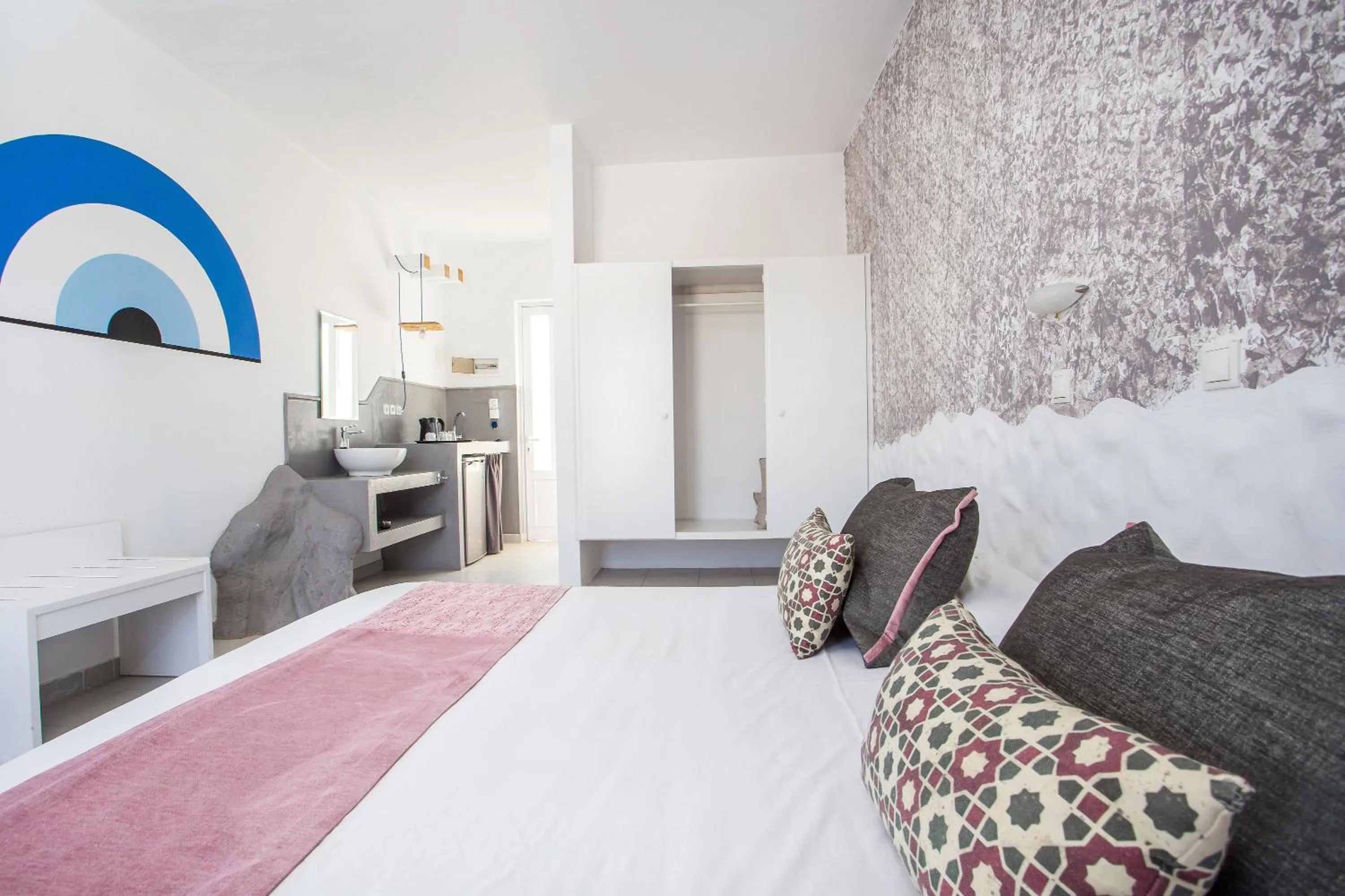 Bed in Tinas Plus Hotel