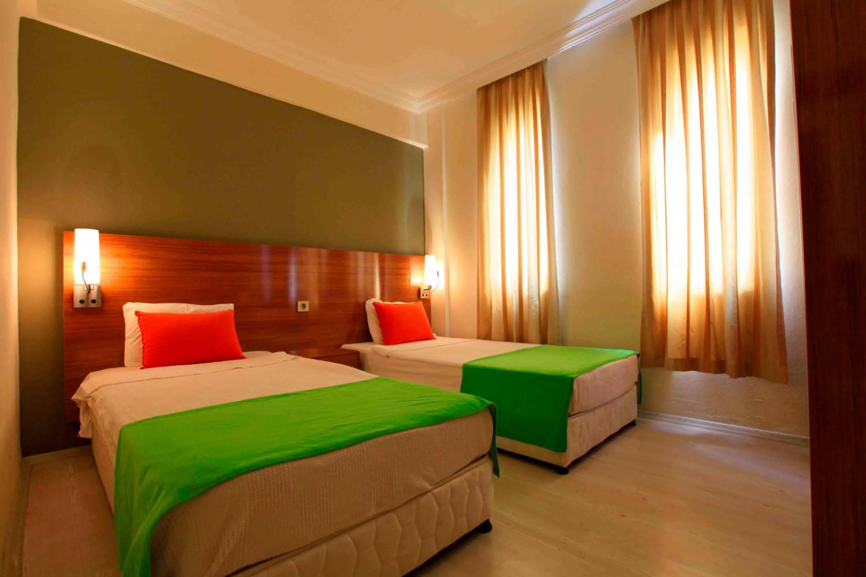 Bed in Sunlight Garden Hotel