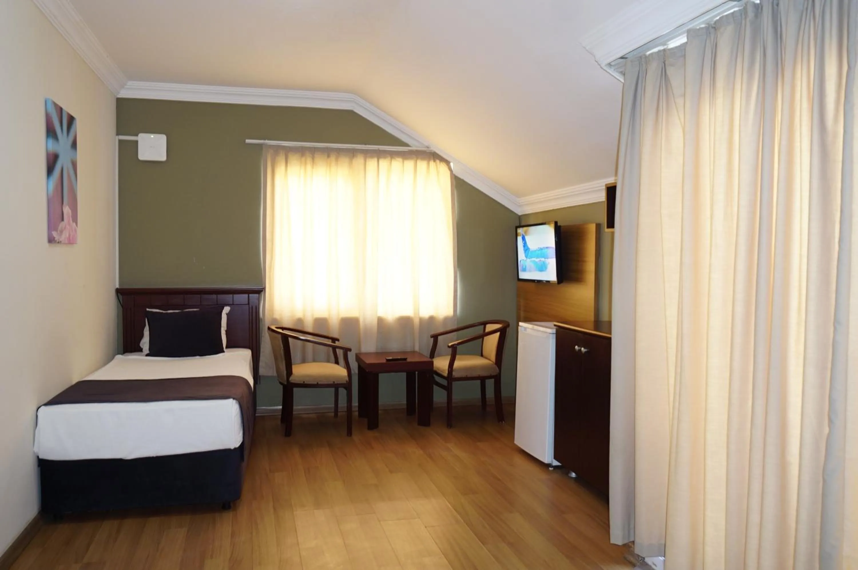 Bed in Sunlight Garden Hotel