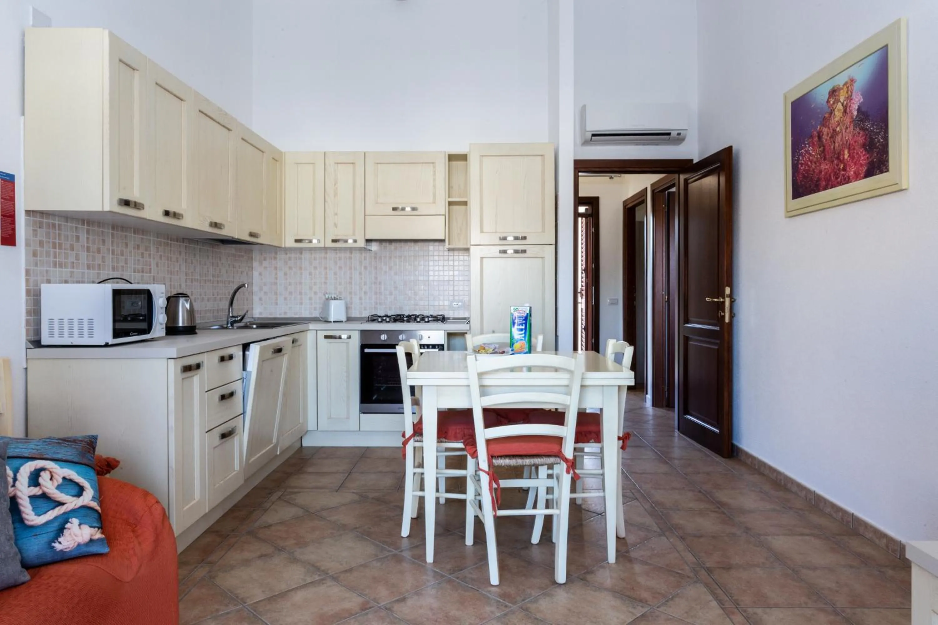Kitchen or kitchenette in villette acquamarina Budoni