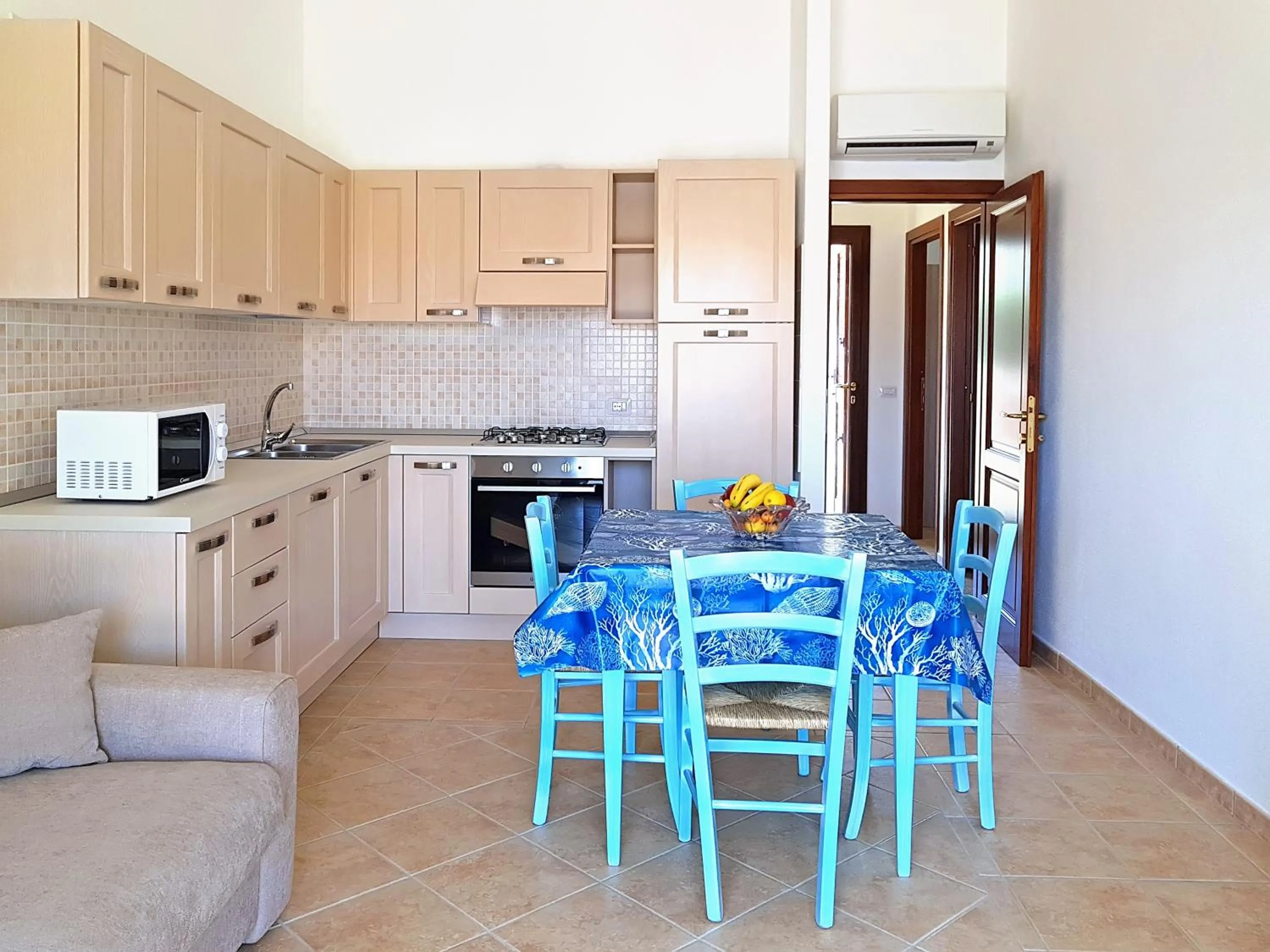 Kitchen or kitchenette in villette acquamarina Budoni