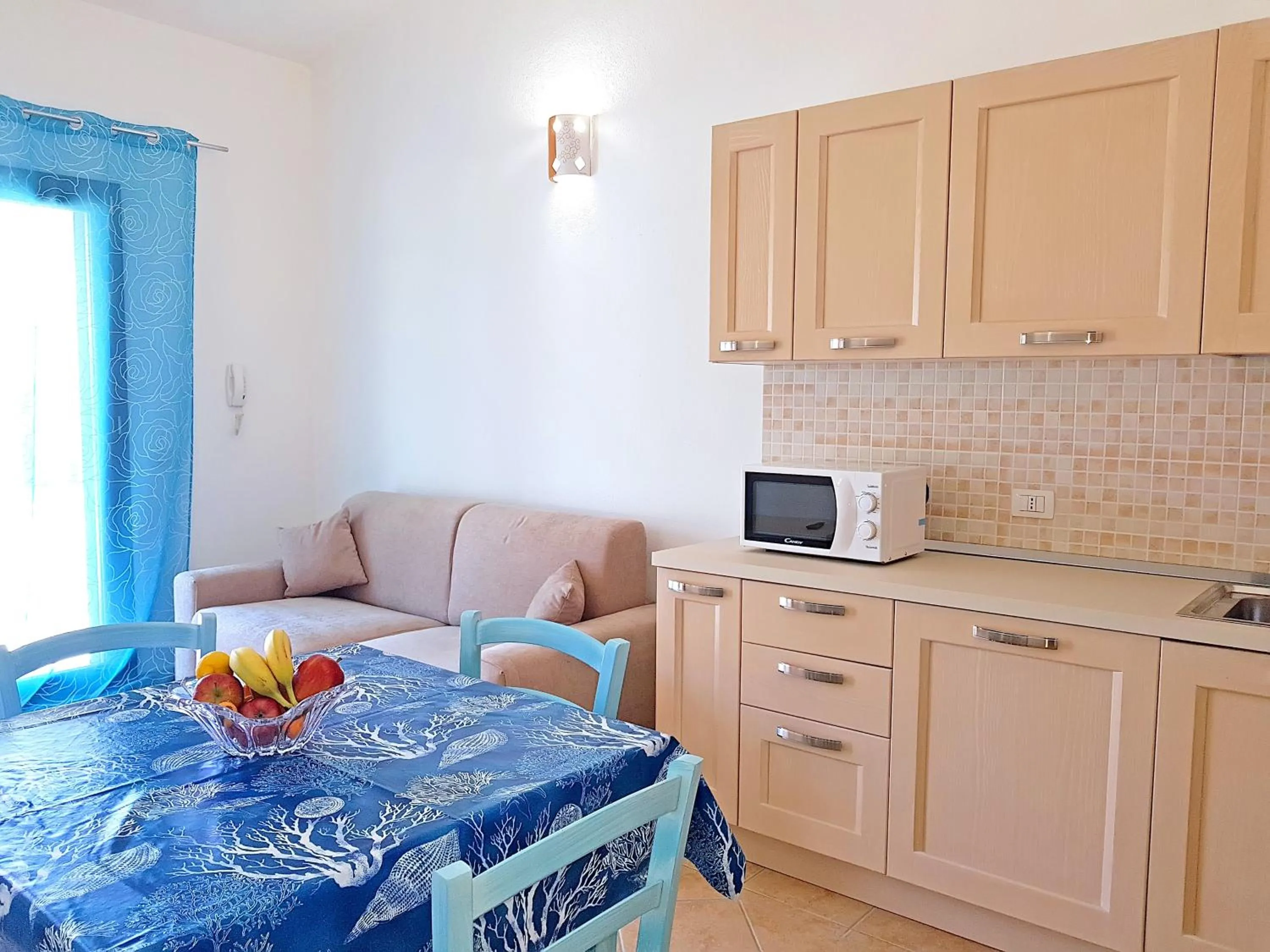 Kitchen or kitchenette in villette acquamarina Budoni