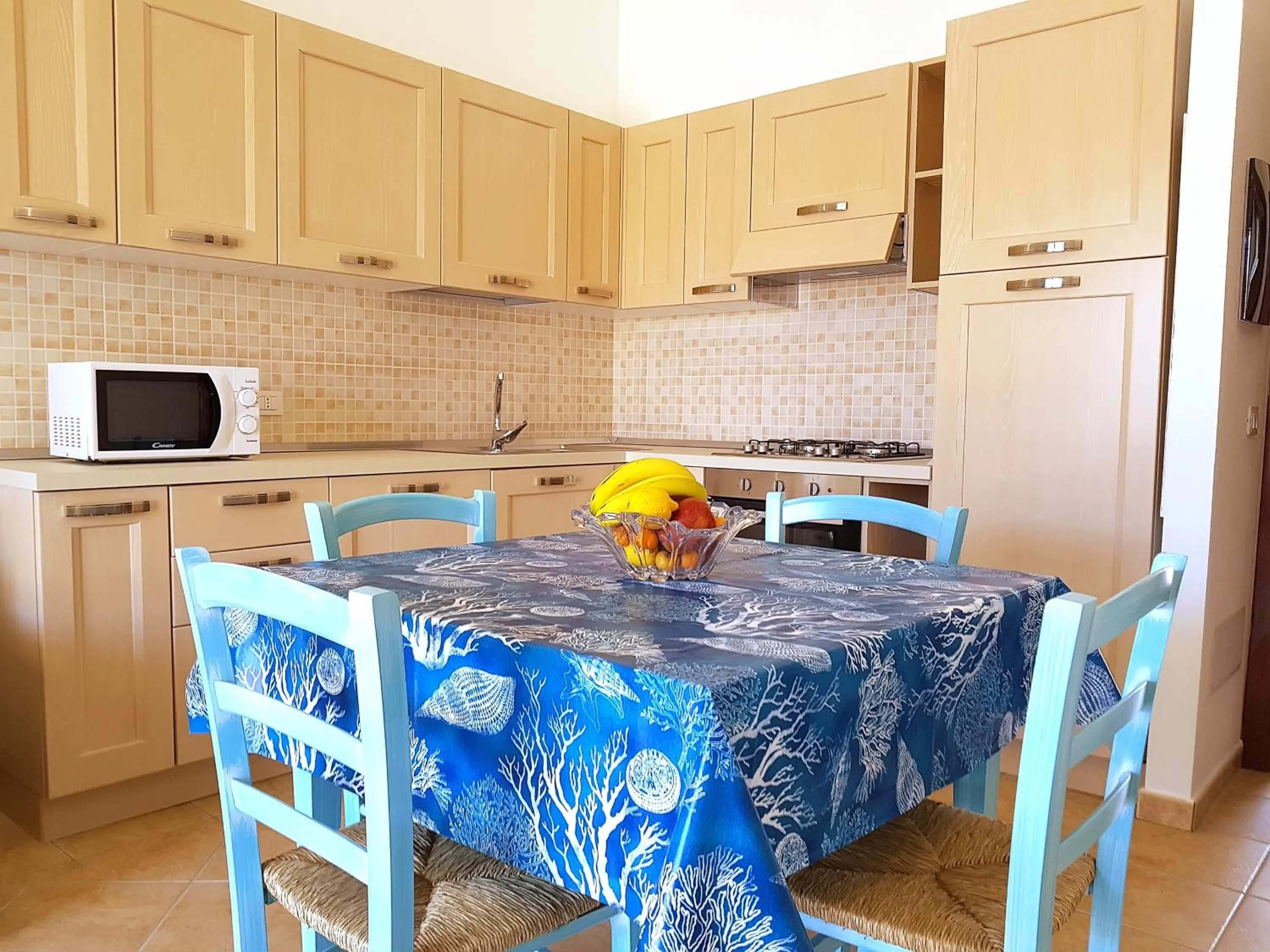 Kitchen or kitchenette in villette acquamarina Budoni