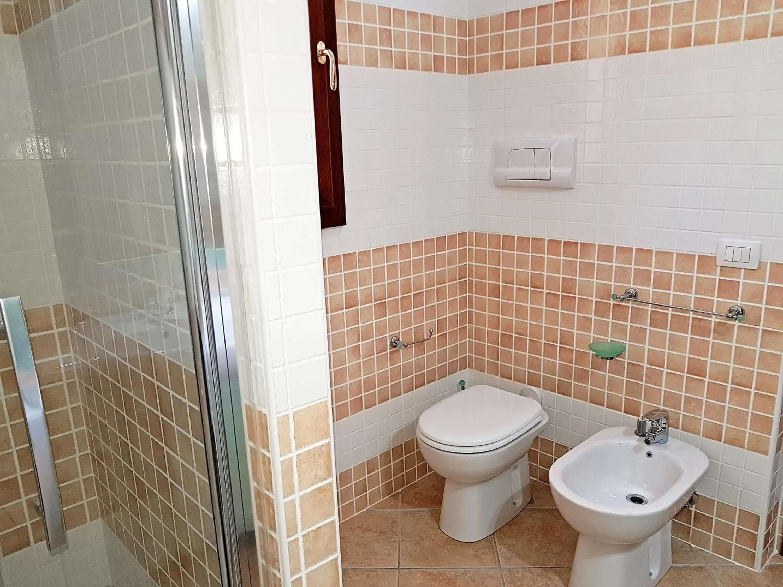 Bathroom in villette acquamarina Budoni