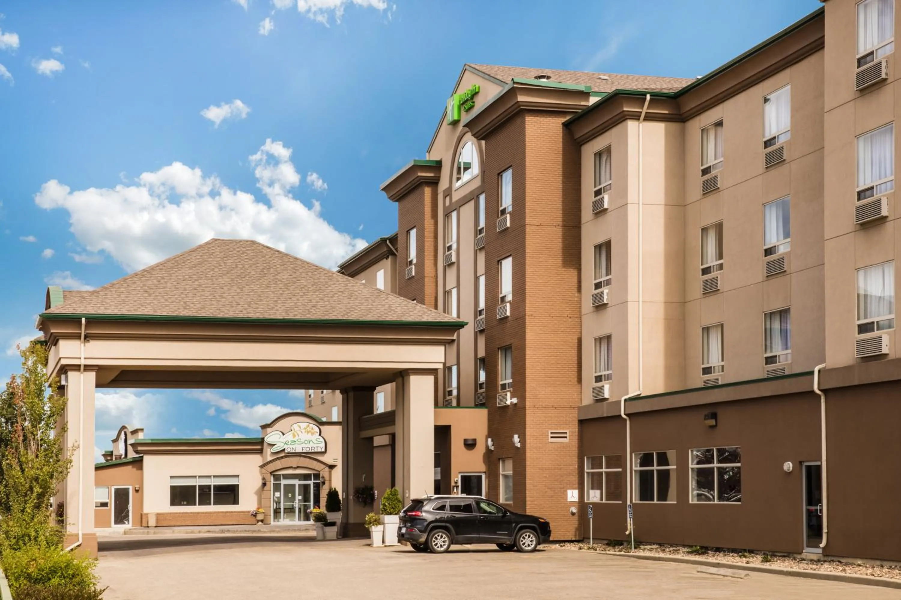 Property building in Holiday Inn & Suites Grande Prairie by IHG