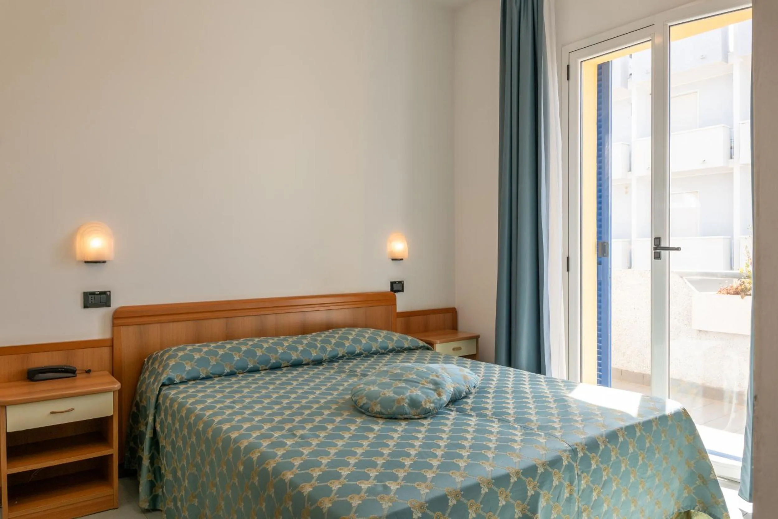 Bedroom in Hotel Thea