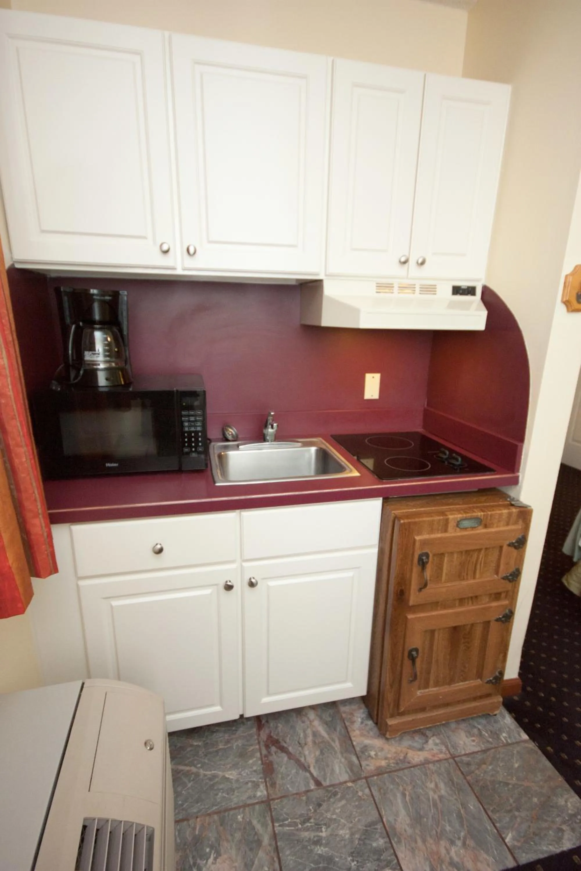 Kitchen or kitchenette in Calypso Boutique Hotel