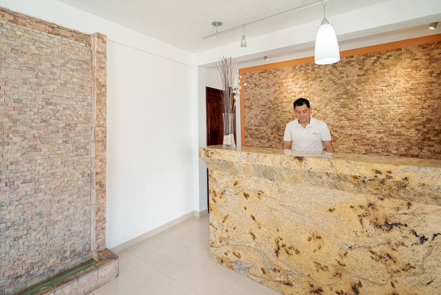 Property building in Hotel Yumkiin - Cerca Del Ferry y Terminal ADO