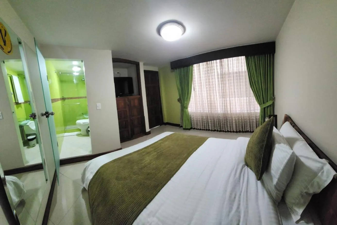 Bed in Apartahotel Vincent Suites