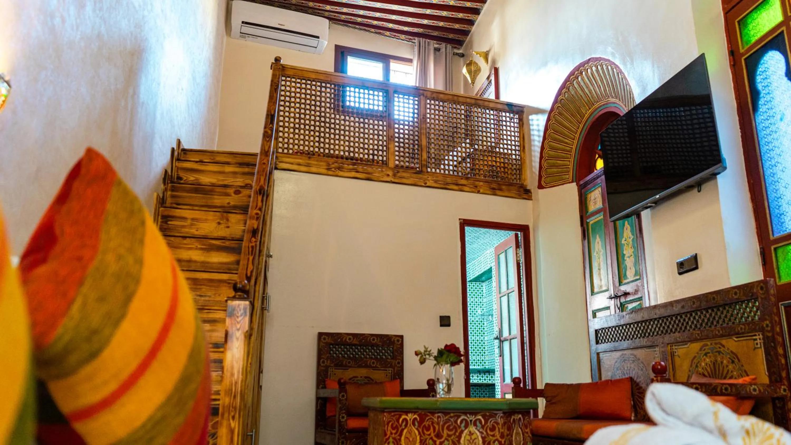 Communal lounge/ TV room in Riad Dar El Ouedghiri