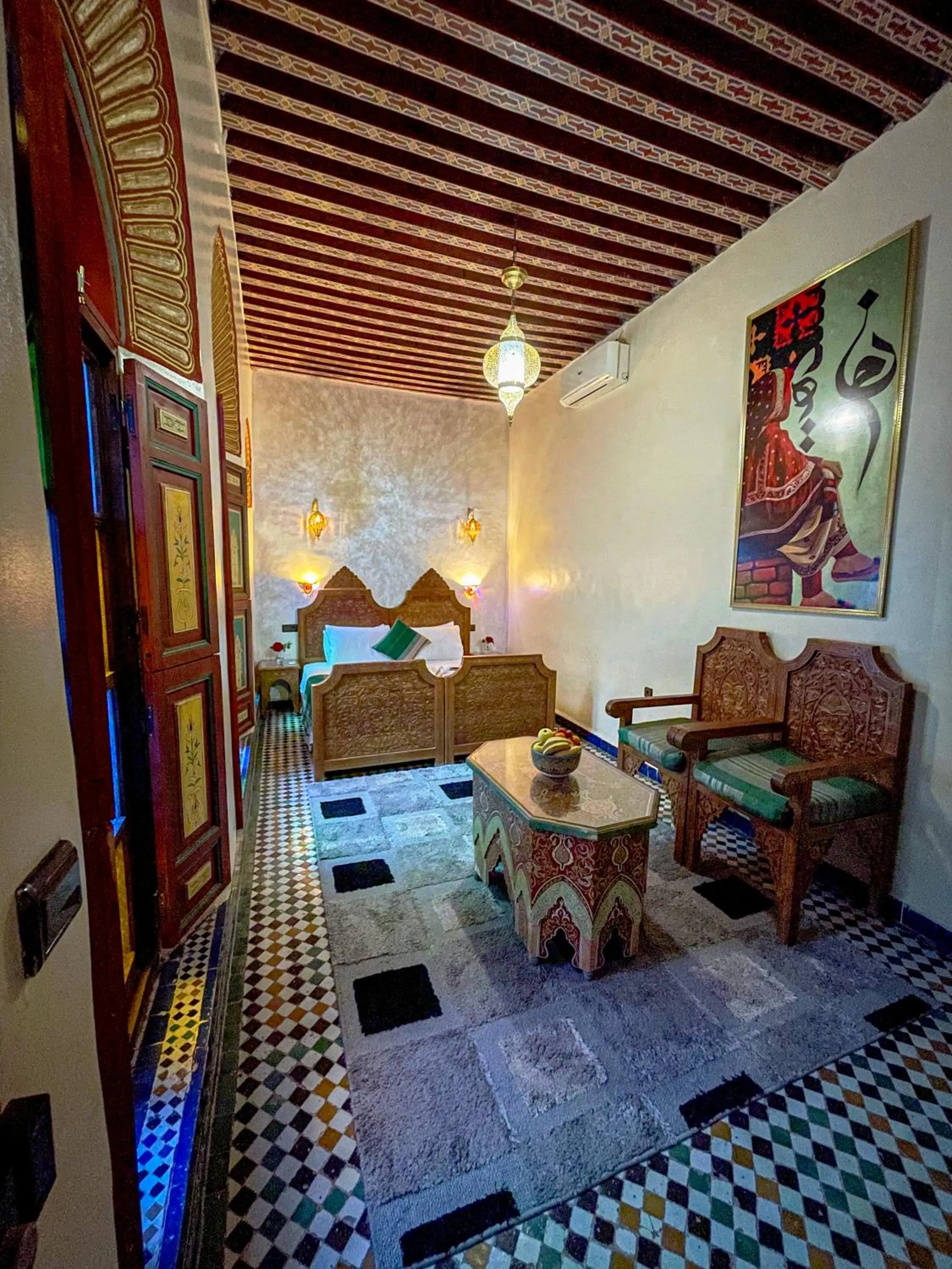 Bed in Riad Dar El Ouedghiri