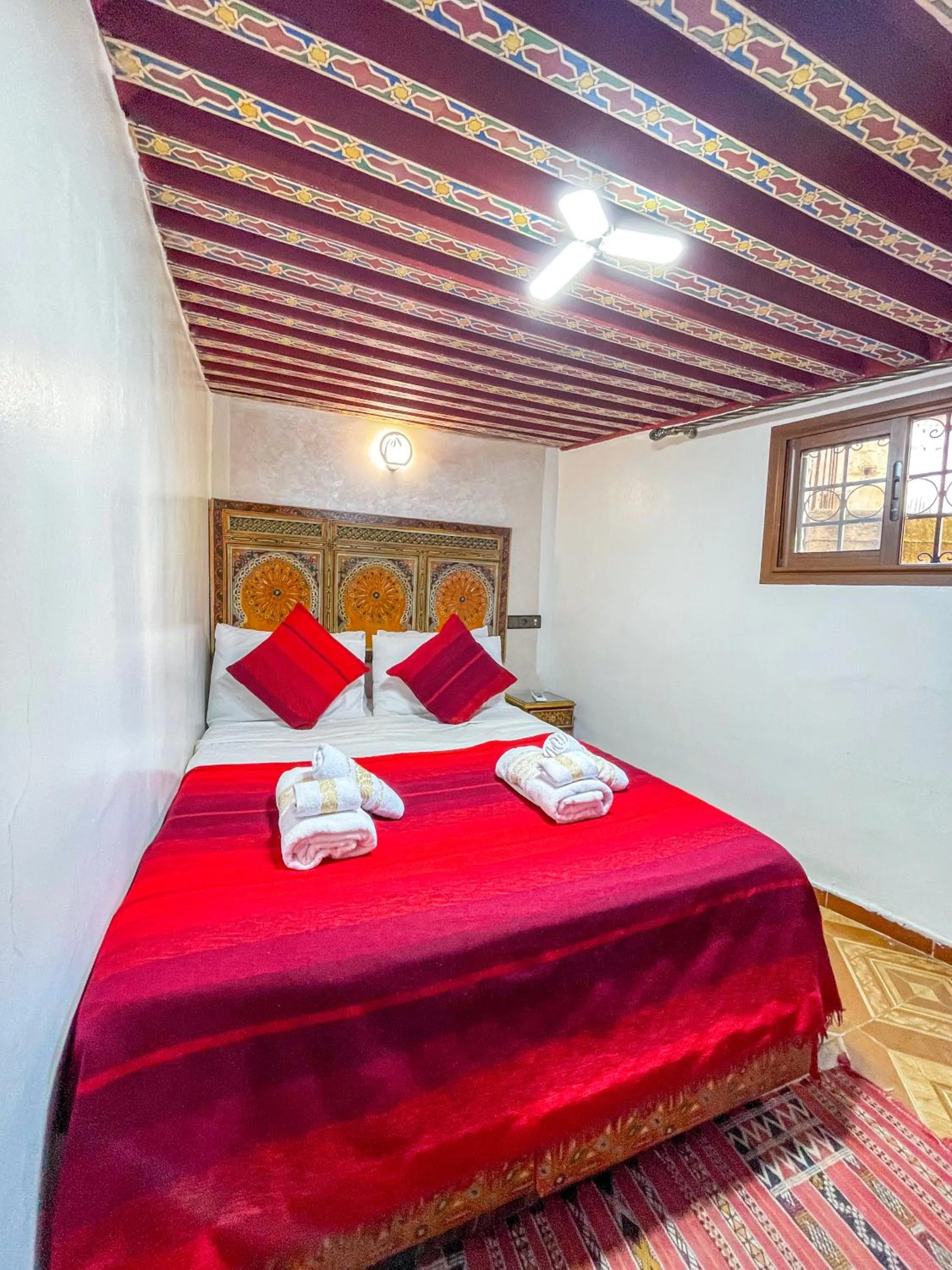 Bed in Riad Dar El Ouedghiri