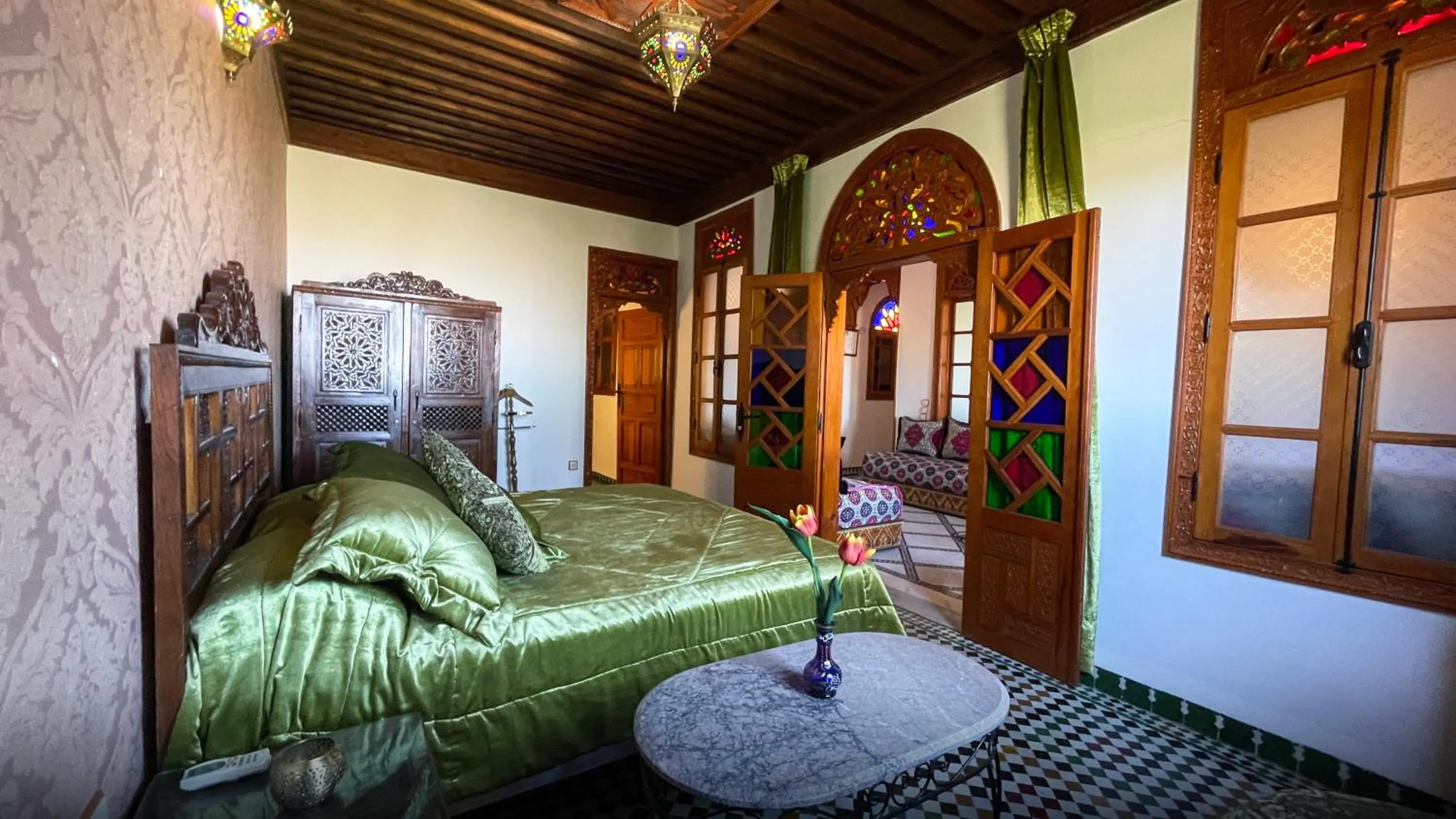 Communal lounge/ TV room, Bed in Riad Dar El Ouedghiri