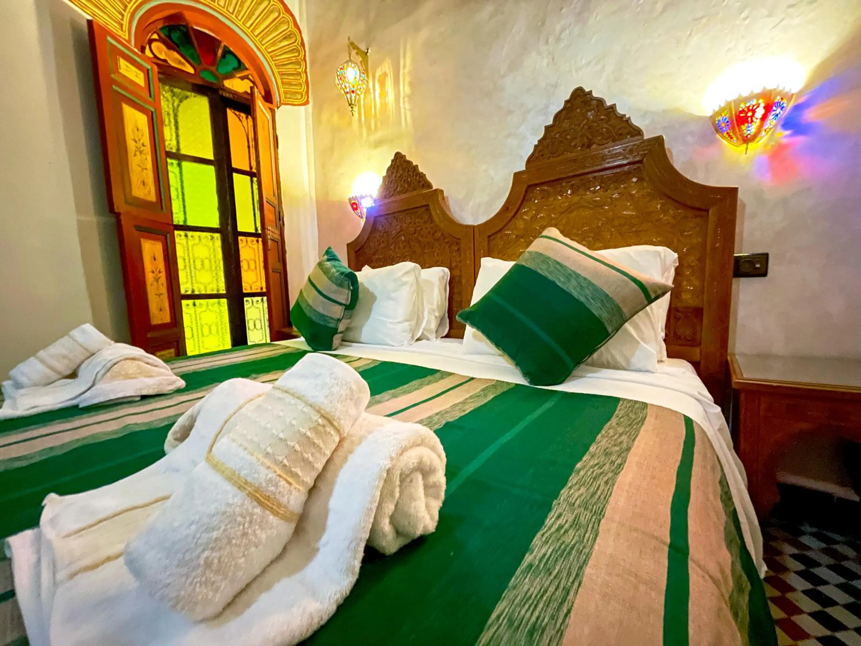 Bed in Riad Dar El Ouedghiri