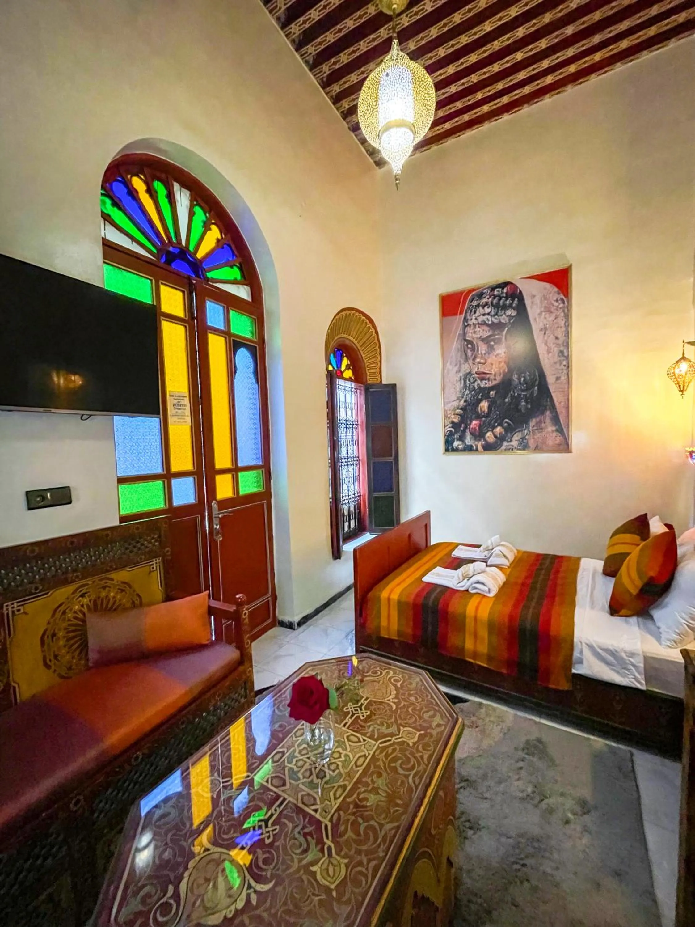 Communal lounge/ TV room, Bed in Riad Dar El Ouedghiri