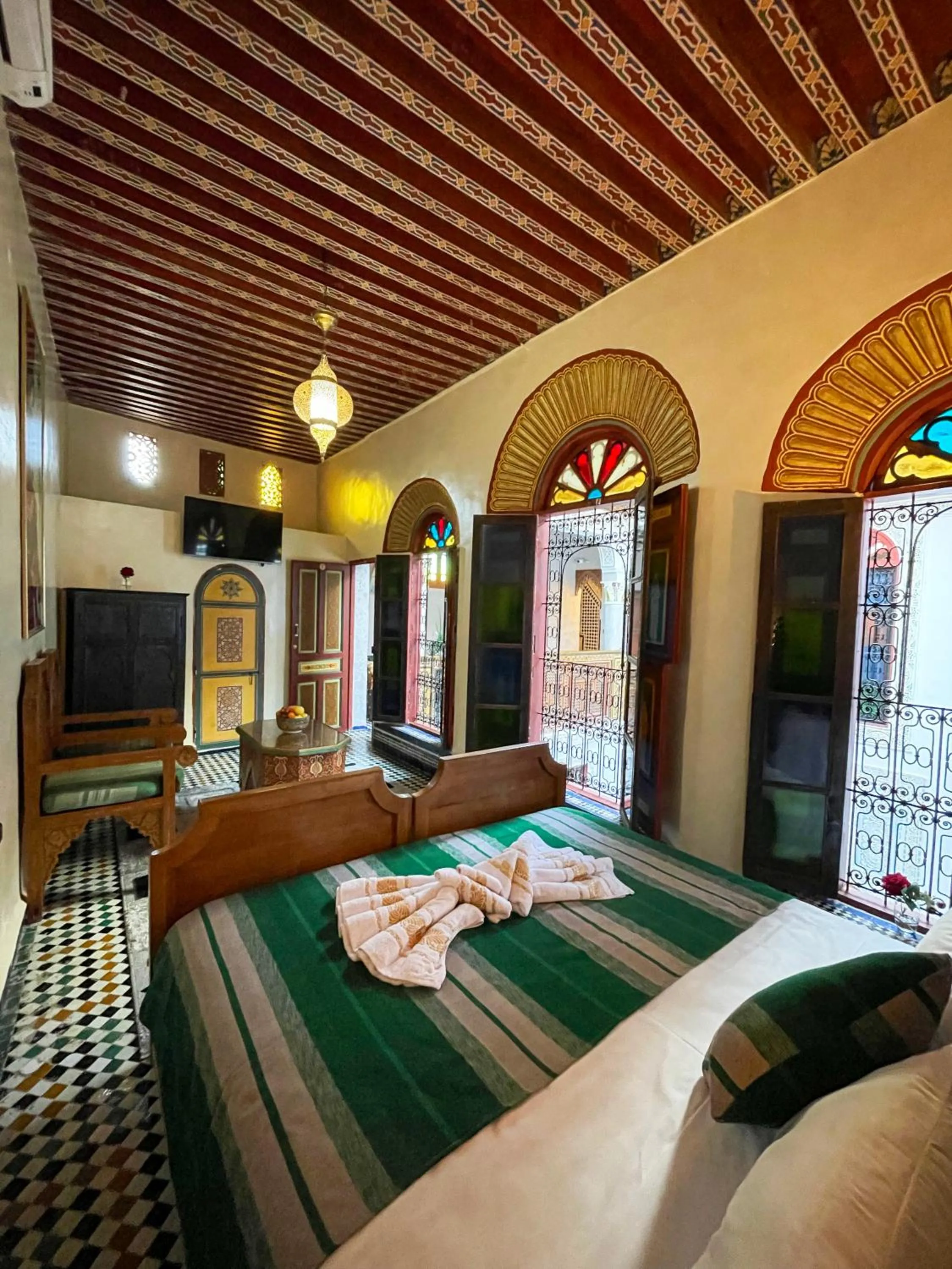 Communal lounge/ TV room, Bed in Riad Dar El Ouedghiri