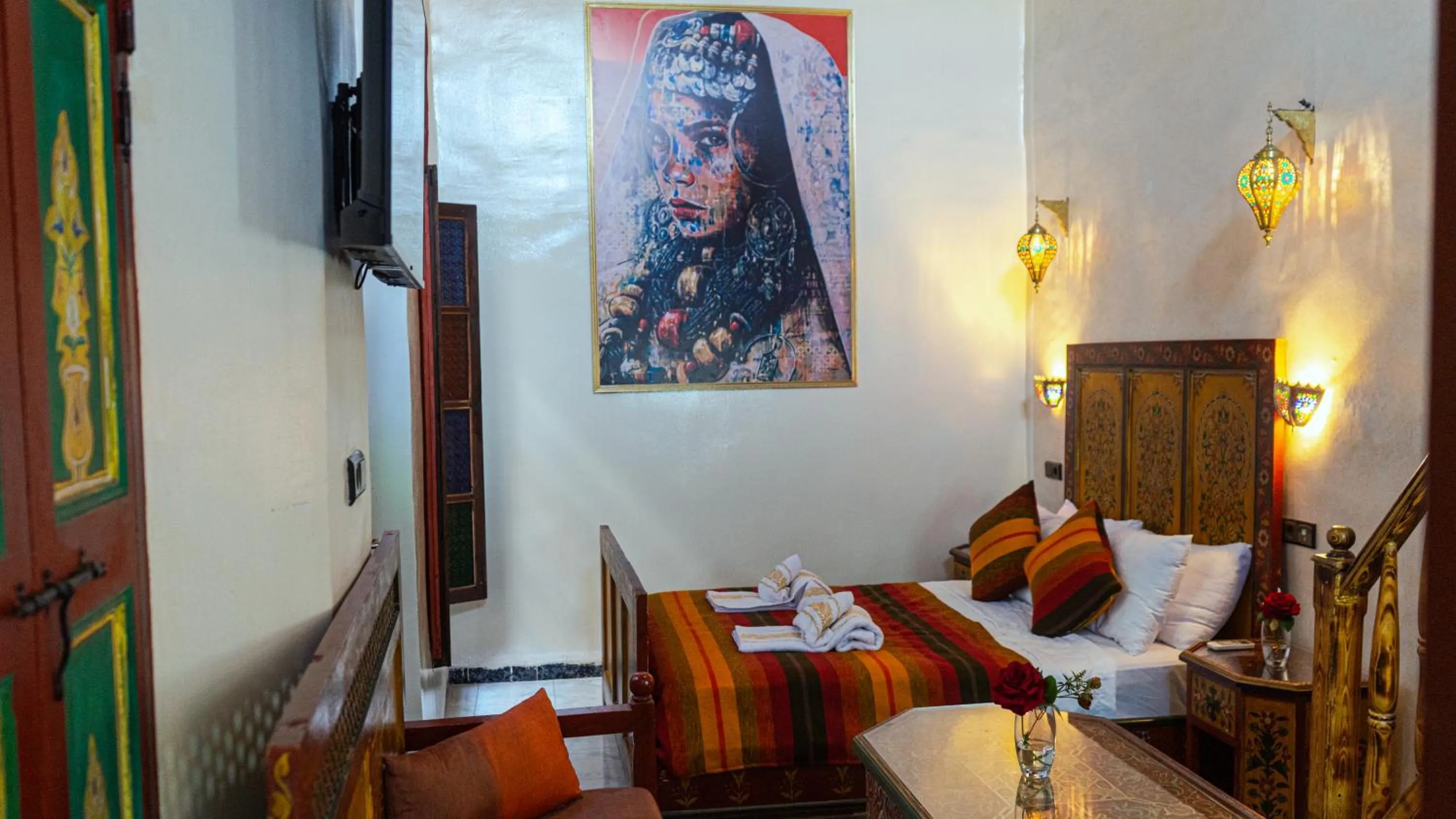 Communal lounge/ TV room, Bed in Riad Dar El Ouedghiri