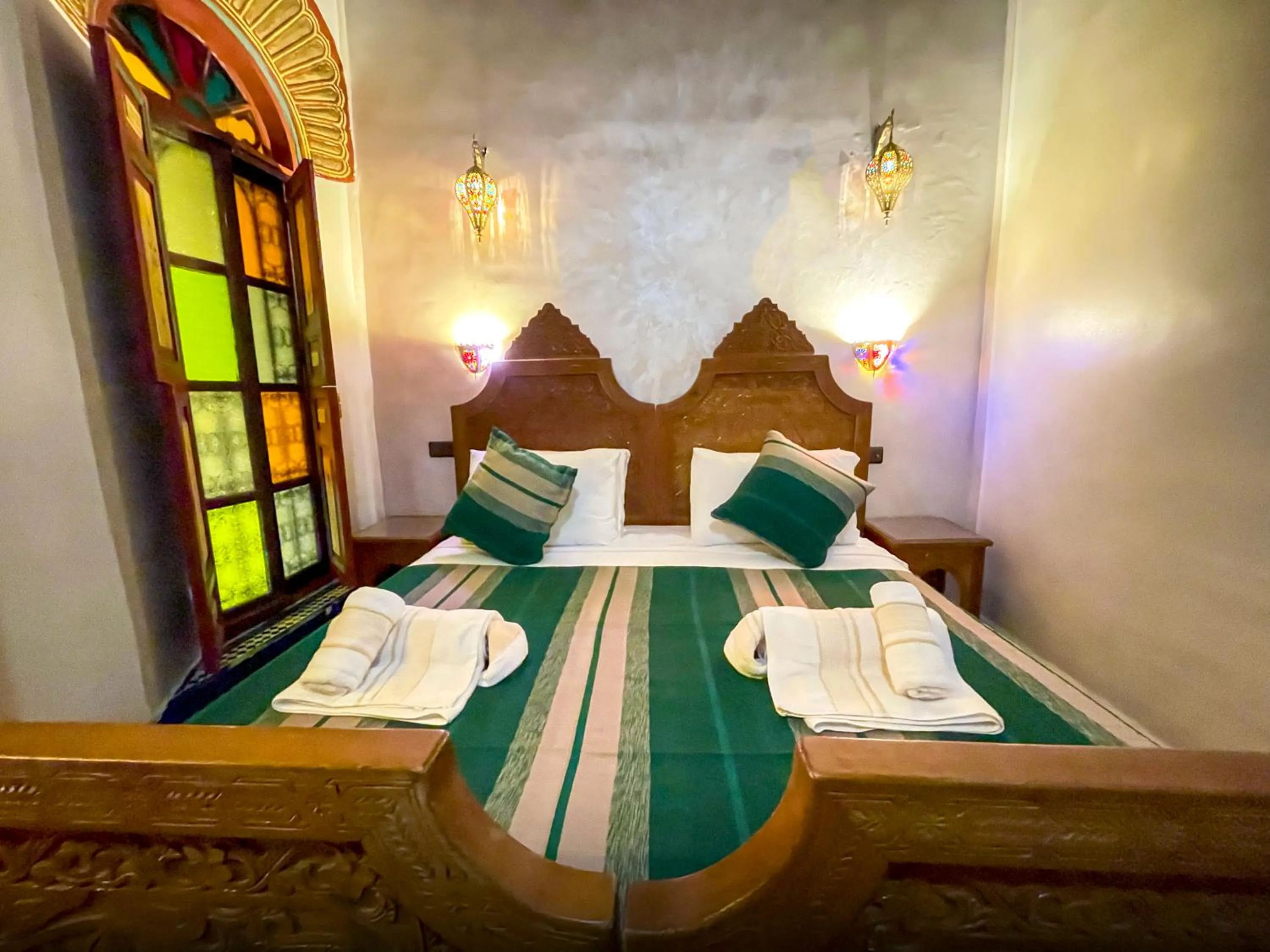 Bed in Riad Dar El Ouedghiri