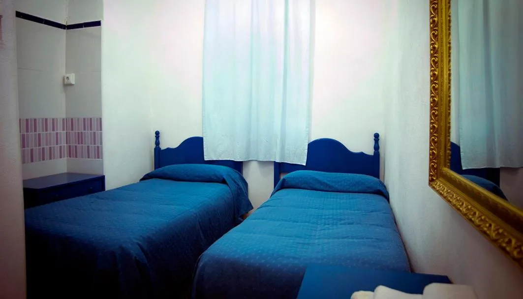 Bed in Pensión Santa María la Blanca