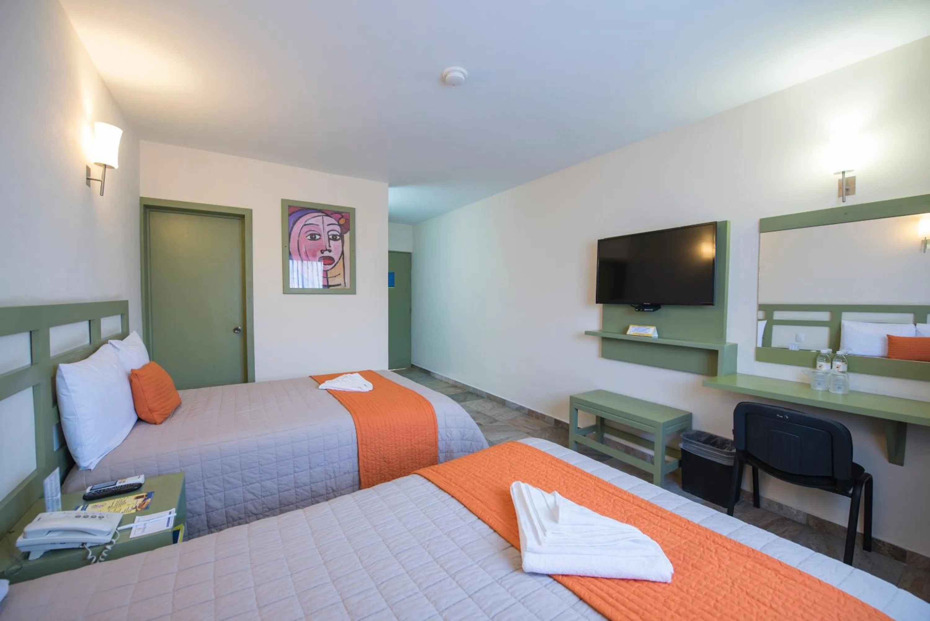 Bed in Hotel Palace Inn