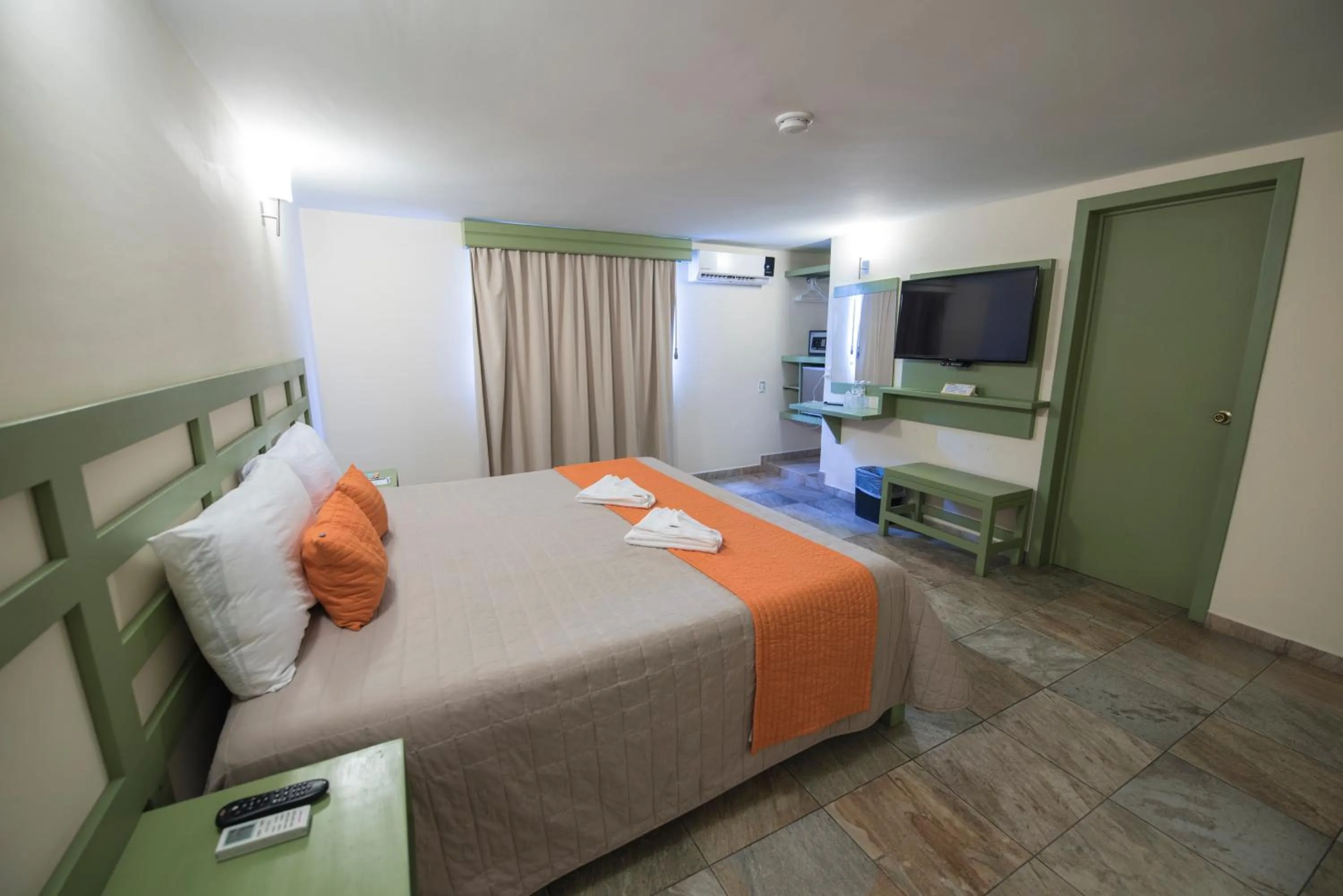 Bed in Hotel Palace Inn