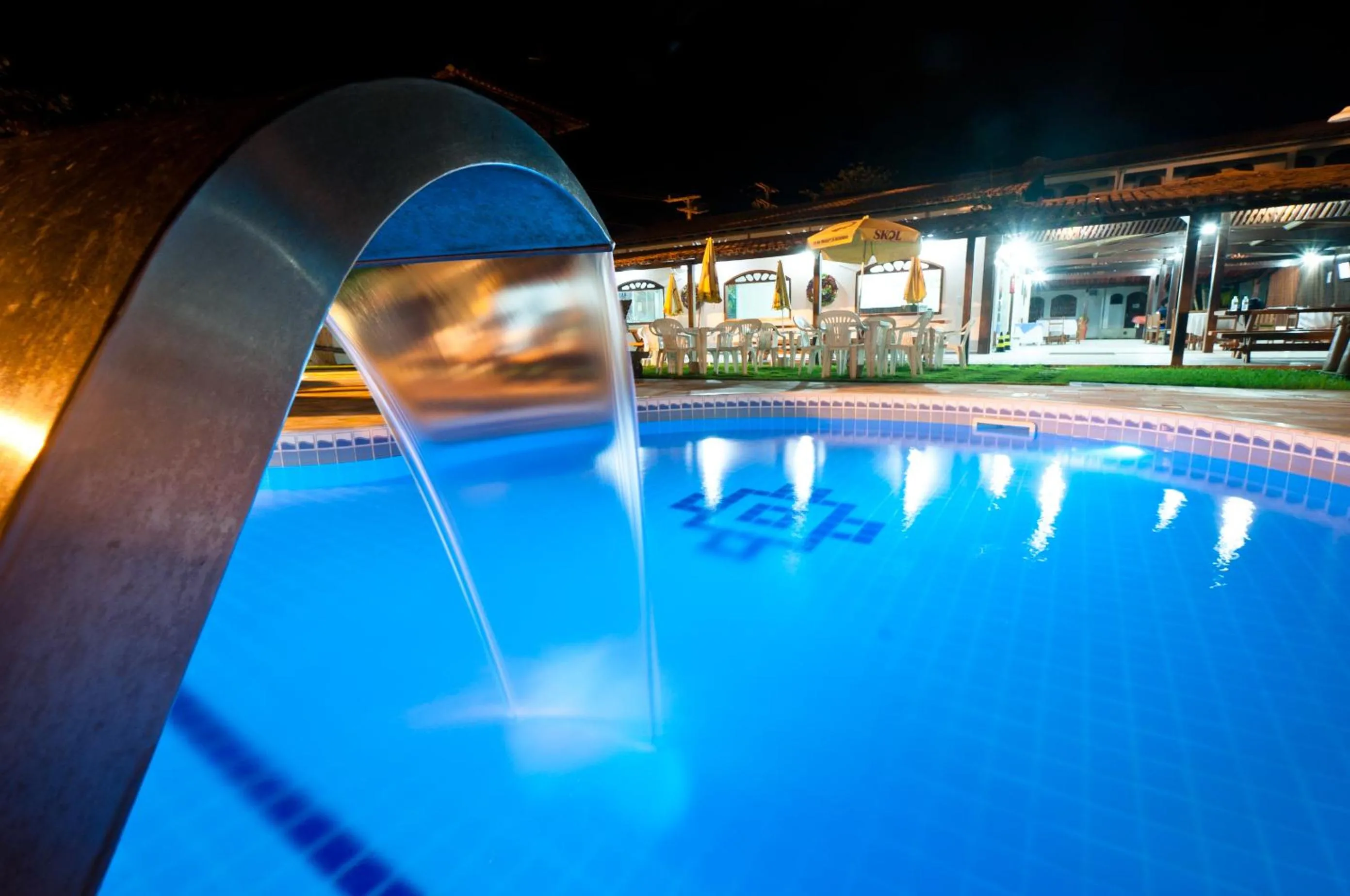 Swimming pool in Pousada Recanto do Prado