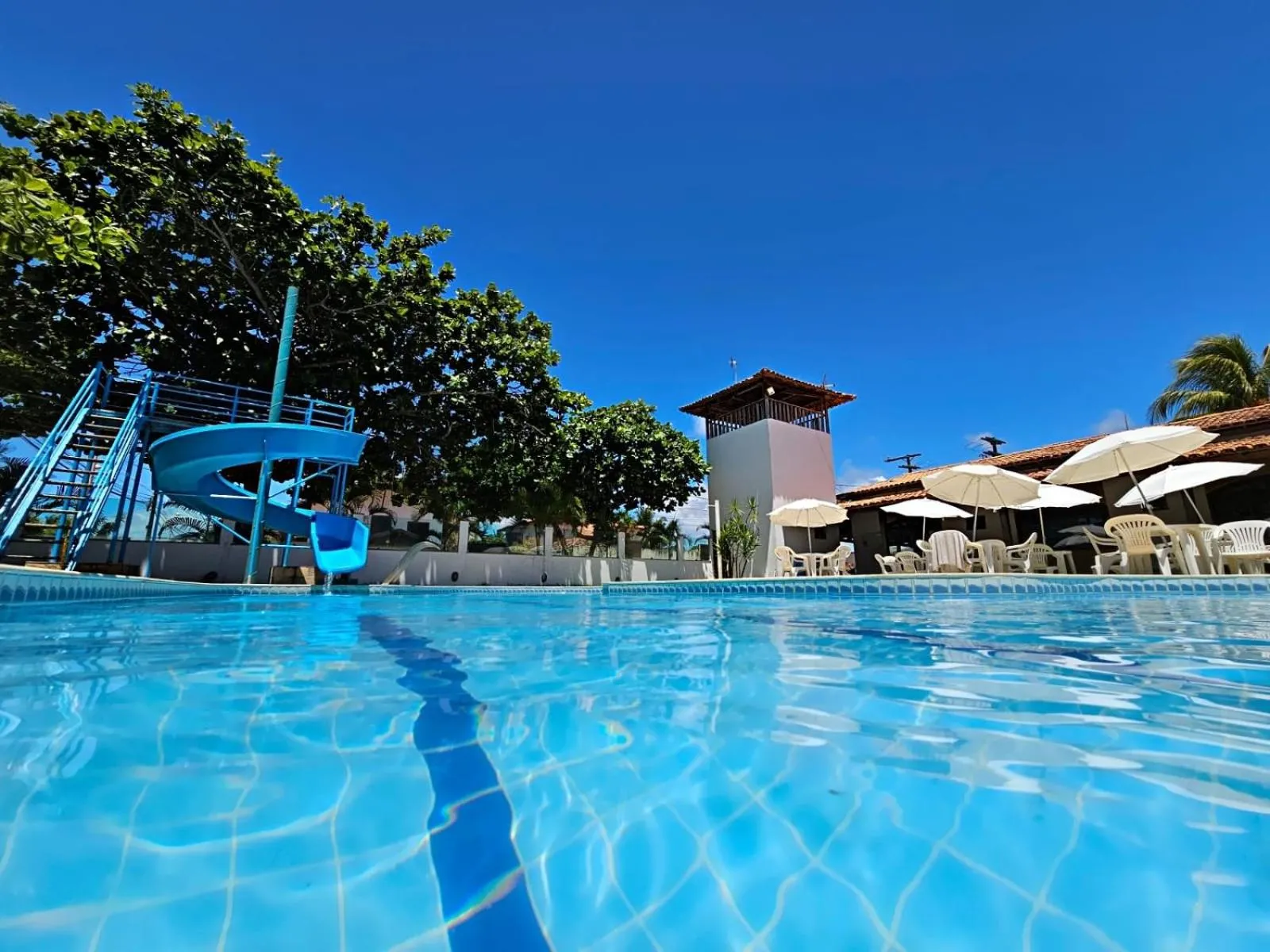 Swimming pool in Pousada Recanto do Prado