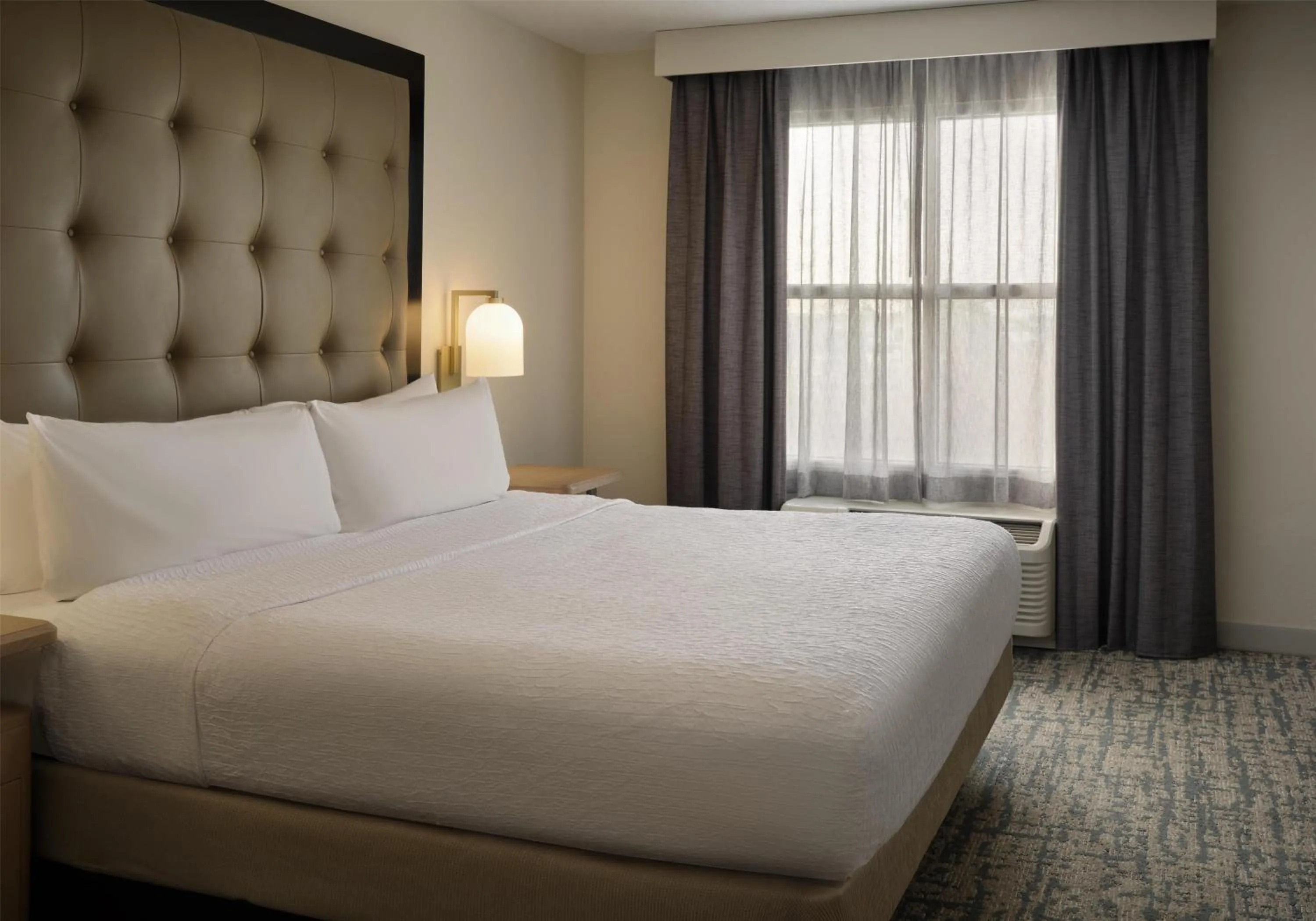 Bed in Homewood Suites by Hilton Daytona Beach Speedway-Airport