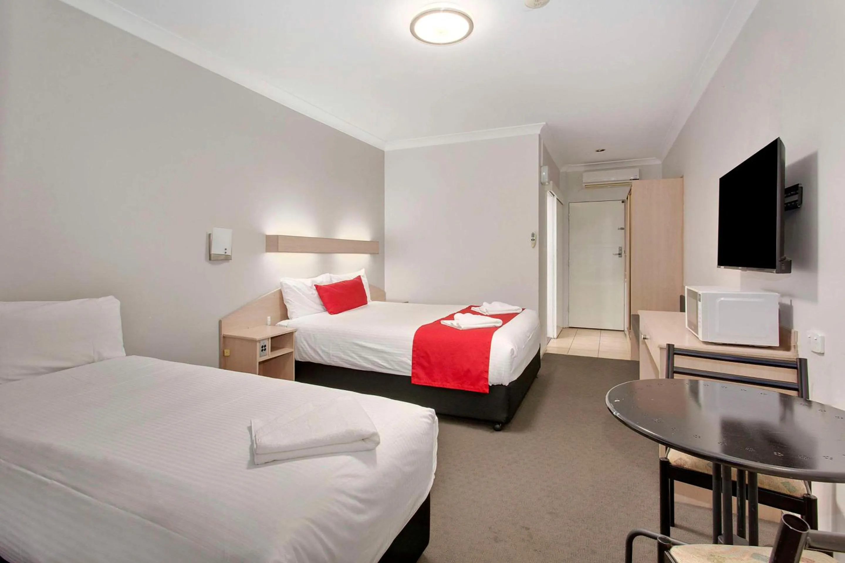 Bedroom, Bed in Econo Lodge Gateway Tamworth
