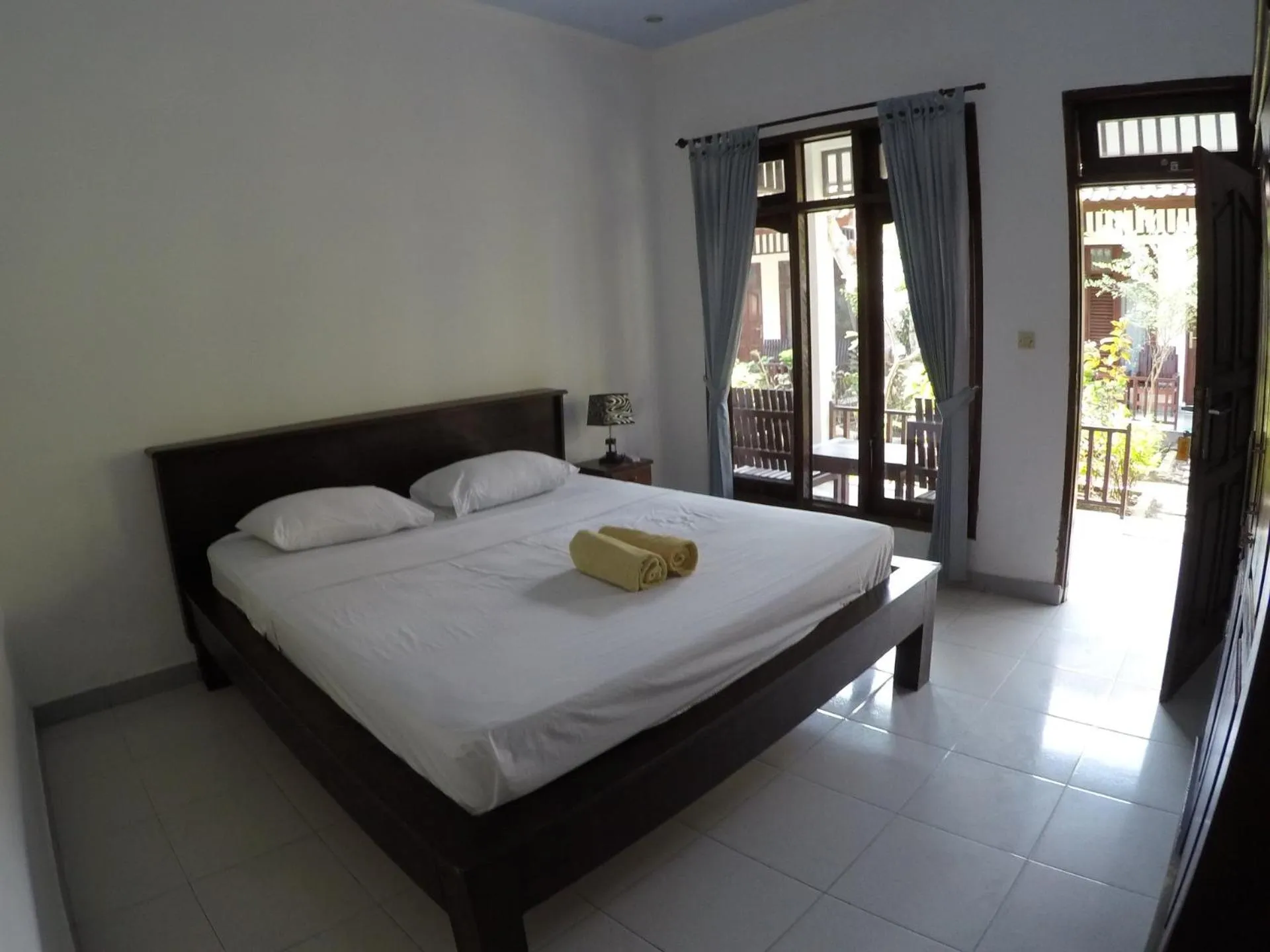 Bed in Gili Smile Bungalow