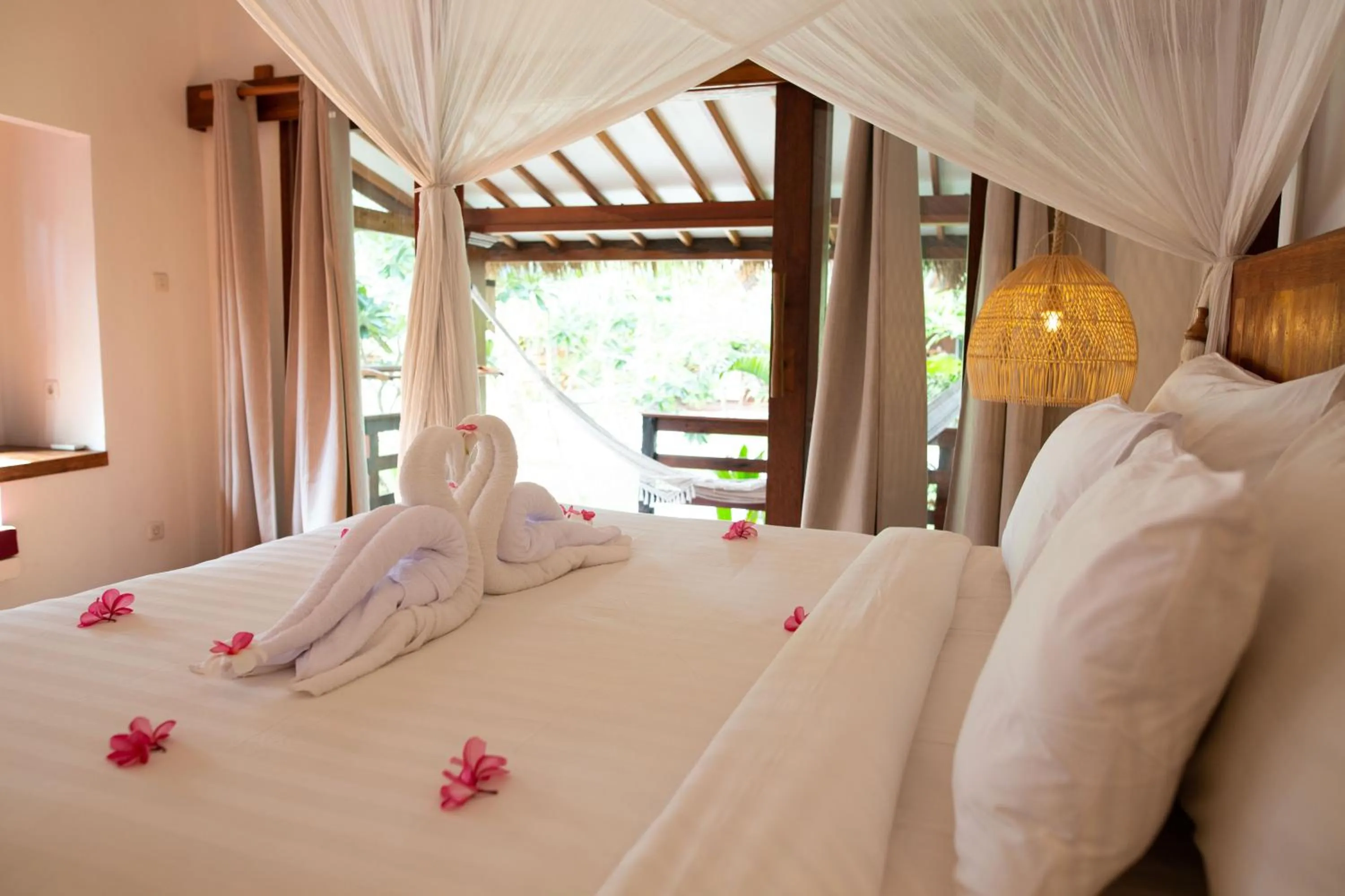 Bed in Island View Bar & Bungalow